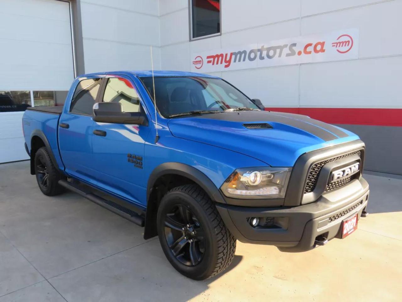 Used 2021 RAM 1500 Classic Warlock (**4WD**ALLOY RIMS**REVERSE CAMERA**HEATED SEATS**HEATED STEERING WHEEL**DUAL CLIMATE CONTROL**FOG LIGHTS**RUNNING BOARDS**TONNEAU COVER**TRAILER HITCH**SUN ROOF**MUD FLAPS**POWER SEATS**CRUISE CONTROL**BLUETOOTH**DIGITAL TOUCHSCREEN**) for sale in Tillsonburg, ON