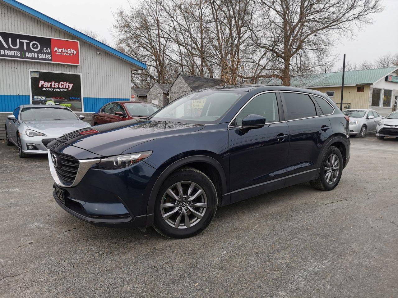 <p>7 PASSENGER - 4 CYLINDER - HEATED SEATS - FWD</p><p>Discover the perfect blend of style, performance, and versatility with the 2018 Mazda CX-9 Sport, now available at Patterson Auto Sales. This pre-owned SUV is designed to elevate your driving experience with its sleek design and powerful 2.5L L4 DOHC 16V engine. Whether you're navigating city streets or embarking on a weekend getaway, the CX-9 Sport offers the reliability and comfort you need. Enjoy spacious seating, advanced safety features, and a refined interior that makes every journey a pleasure. Don't miss your chance to own this exceptional vehiclevisit us today and experience the Mazda CX-9 Sport for yourself!</p>