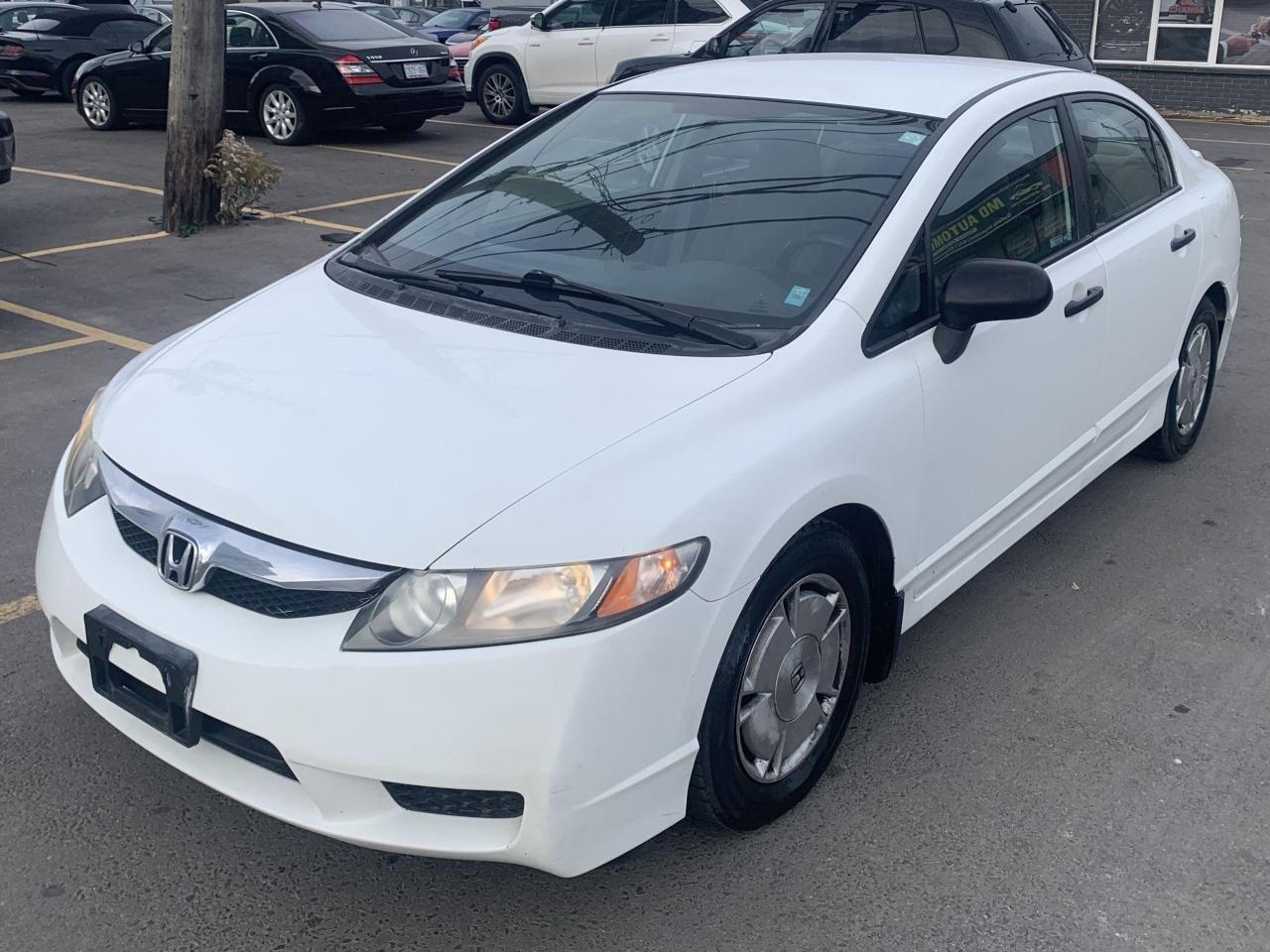 2010 Honda Civic 4dr Auto DX-G Photo2