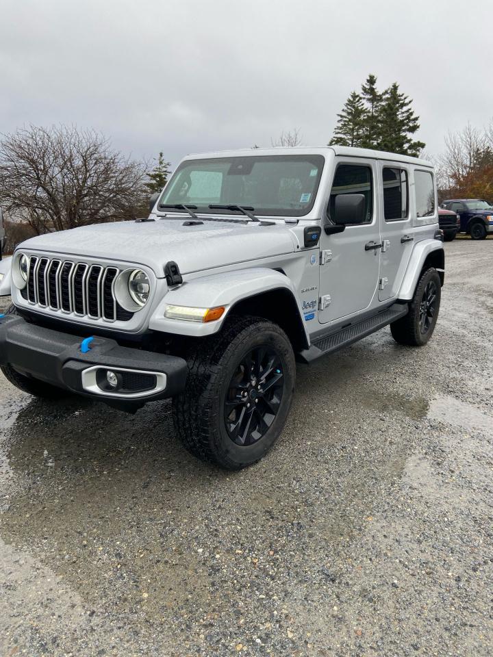 <p>Plug in Hybrid</p><p>Hybrid pages</p><p>Freedom hard top</p><p>Full metal doors</p><p>Conv differential front axle disconnect</p><p>Off road pages</p><p>Skid plates</p><p>10 radio screen</p><p>Keyless entry</p><p>Power windows and locks</p><p>Adaptive cruise</p><p>Heated front seats</p><p>Alpine premium sound system</p><p>Navigation</p><p> </p><p> </p><p> </p>