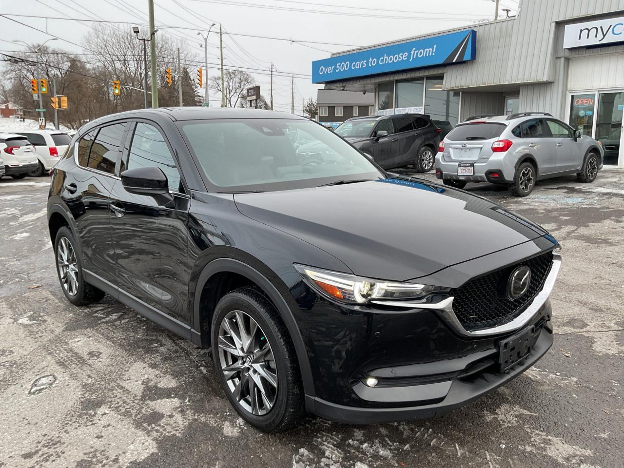 Used 2021 Mazda CX-5 Signature 2.5L SIGNATURE AWD!!!   SUNROOF. HEATED SEATS. LEATHER. NAV. BACKUP CAM. ALLOYS. A/C. CRUISE. PWR GR for sale in Kingston, ON