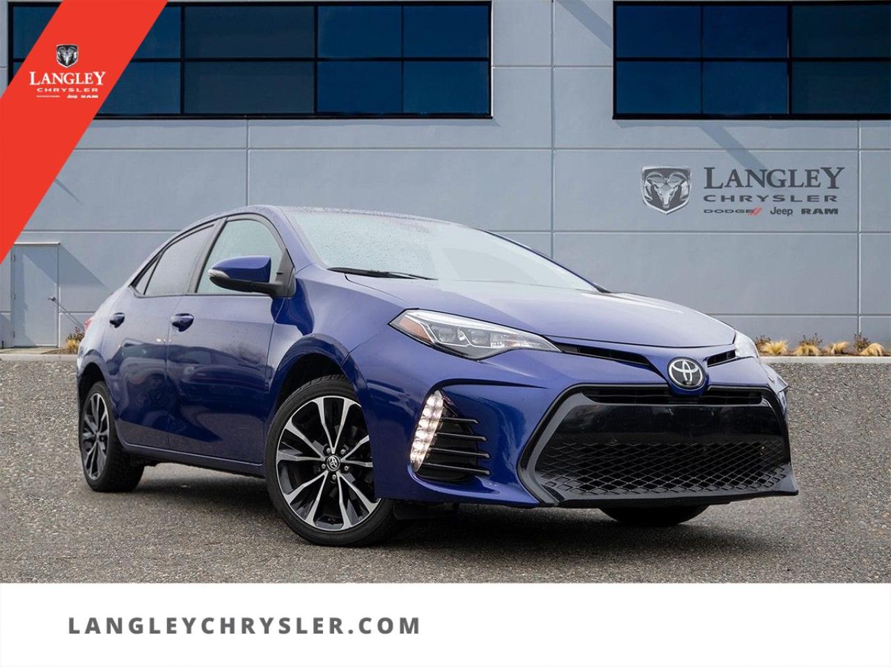 <p><strong><span style=font-family:Arial; font-size:18px;>Sunroof | Lane Departure | Heated Seats</span></strong></p> <p><span style=font-family:Arial; font-size:18px;></span></p> <ul><li><span style=font-family:Arial; font-size:18px;>Sunroof for a breath of fresh air and open sky views</span></li><li><span style=font-family:Arial; font-size:18px;>Lane Departure to keep you safe and on track</span></li><li><span style=font-family:Arial; font-size:18px;>Heated Seats for ultimate comfort in any season</span></li><li><span style=font-family:Arial; font-size:18px;>6-Speed Manual transmission for a dynamic drive</span></li><li><span style=font-family:Arial; font-size:18px;>1.8L 4-cylinder engine delivering efficiency and power</span></li><li><span style=font-family:Arial; font-size:18px;>Exterior parking camera rear for easy maneuvering</span></li><li><span style=font-family:Arial; font-size:18px;>Auto high-beam headlights for optimal visibility</span></li></ul> <p><span style=font-family:Arial; font-size:18px;></span></p> <p><span style=font-family:Arial; font-size:18px;>Experience the road like never before in this 2019 Toyota Corolla CE Sedan. With 131,241 km on the odometer, this blue beauty is equipped to elevate your driving experience.</span></p> <p><span style=font-family:Arial; font-size:18px;>**Key Features:**</span></p> <p><span style=font-family:Arial; font-size:18px;>This used Toyota Corolla is more than just a vehicle; its your ticket to adventure. With a sleek blue exterior and a comfortable grey interior, youll drive in style and comfort. Enjoy the harmony of CD-MP3 decoder tunes while the power windows and steering provide seamless control.</span></p> <p><span style=font-family:Arial; font-size:18px;>Safety and convenience are standard with features like traction control, ABS brakes, and dual front and side airbags, ensuring peace of mind on every journey. The split folding rear seat makes it versatile for cargo and passenger needs.</span></p> <p><span style=font-family:Arial; font-size:18px;>Blue sky above,</span></p> <p><span style=font-family:Arial; font-size:18px;>Road stretches to the horizon,</span></p> <p><span style=font-family:Arial; font-size:18px;>Drive, dream, and explore.</span></p> <p><span style=font-family:Arial; font-size:18px;>Dont just love your car, love buying it! Visit Langley Chrysler today to make this 2019 Toyota Corolla yours</span></p>Dealer number: 5097, Doc fee: $968 Safety & Convince Warranty: $699 Finance Placement: $628

<p>*All prices plus applicable taxes, applicable environmental recovery charges, documentation of $599 and full tank of fuel surcharge of $76 if a full tank is chosen. <br />Other protection items available that are not included in the above price:<br />Tire & Rim Protection and Key fob insurance starting from $599<br />Service contracts (extended warranties) for coverage up to 7 years and 200,000 kms starting from $599<br />Custom vehicle accessory packages, mudflaps and deflectors, tire and rim packages, lift kits, exhaust kits and tonneau covers, canopies and much more that can be added to your payment at time of purchase<br />Undercoating, rust modules, and full protection packages starting from $199<br />Financing Fee of $500 when applicable<br />Flexible life, disability and critical illness insurances to protect portions of or the entire length of vehicle loan</p>