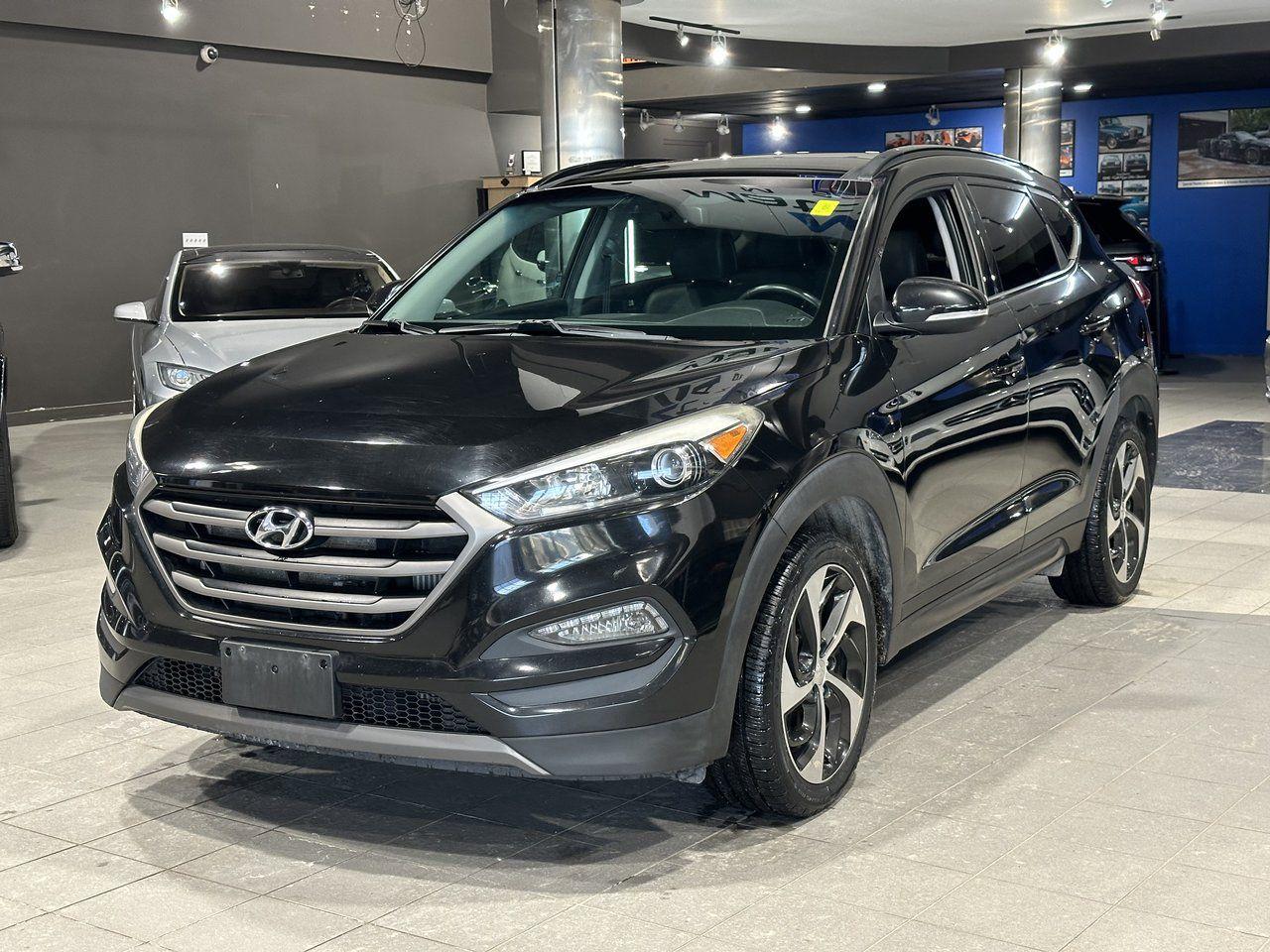 <p><strong>High Value Options:</strong></p><ul><li>Limited Trim</li><li>All-Wheel Drive (AWD)</li><li>Leather Seats</li><li>Navigation</li><li>Push to Start</li></ul><p>The 2016 Hyundai Tucson Limited is a well-equipped and stylish compact SUV that combines comfort, performance, and convenience. This model features all-wheel drive (AWD) for enhanced traction and control in various driving conditions, making it a reliable choice for both city and off-road adventures. The leather seats provide a touch of luxury and comfort, while the navigation system ensures you stay on the right path with ease. The push-to-start feature adds a modern, seamless start-up experience. The Tucson Limited is perfect for drivers seeking a vehicle with premium features and a high level of practicality.</p><p>3 Month/5000 KM Powertrain Warranty on every vehicle! 3-month warranty price is included in the advertised price. Extended warranties available (extended warranty prices not included). Every vehicle sold at Match is clean title. We do not sell ANY rebuilt vehicles. We also provide a verified CarFax report for each vehicle.</p><p>Financing available; please visit <a target=_blank rel=noopener noreferrer href=http://www.matchautomarket.ca><a rel=noopener target=_new><span>www.matchautomarket.ca</span></a></a>. Dealer permit: 4858 Address: 231 Oak Point Hwy</p>