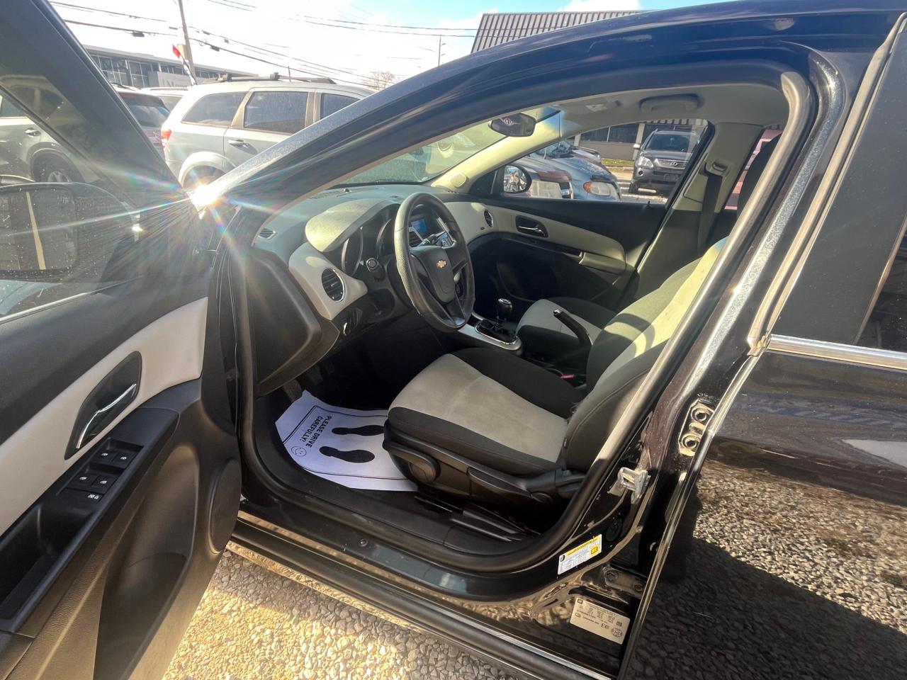 2011 Chevrolet Cruze ONE OWNER, Clean CARFAX, LOW KM with Safety and 1 year $5000 Powertrain Warranty. Photo