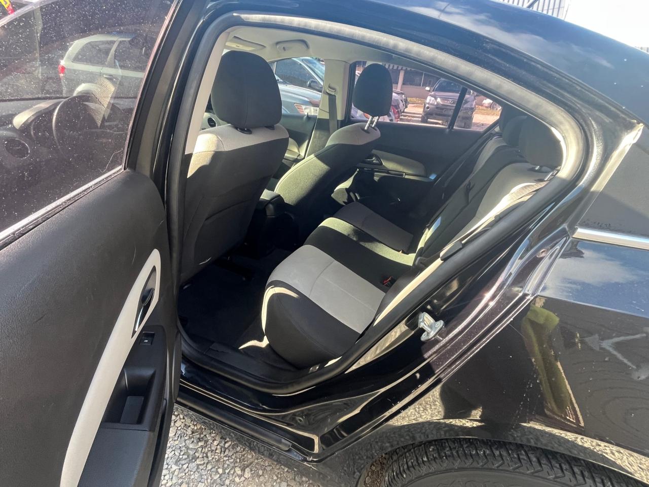 2011 Chevrolet Cruze ONE OWNER, Clean CARFAX, LOW KM with Safety and 1 year $5000 Powertrain Warranty. Photo