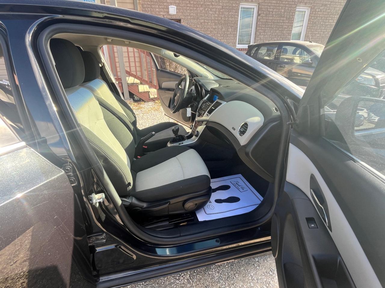 2011 Chevrolet Cruze ONE OWNER, Clean CARFAX, LOW KM with Safety and 1 year $5000 Powertrain Warranty. Photo