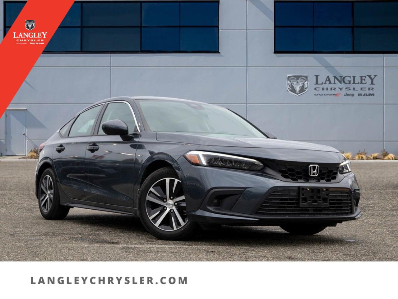 <p><strong><span style=font-family:Arial; font-size:18px;>Bask in the glory of an unparalleled motoring experience with this brilliant 2023 Honda Civic LX Hatchback.</span></strong></p> <p><span style=font-family:Arial; font-size:18px;></span></p> <ul><li><span style=font-family:Arial; font-size:18px;>**Mileage:** 20,321 km</span></li><li><span style=font-family:Arial; font-size:18px;>**Exterior Colour:** Grey</span></li><li><span style=font-family:Arial; font-size:18px;>**Transmission:** CVT</span></li><li><span style=font-family:Arial; font-size:18px;>**Engine:** 2.0L 4-cylinder</span></li><li><span style=font-family:Arial; font-size:18px;>**Key Features:**</span></li><li><span style=font-family:Arial; font-size:18px;>Adaptive Cruise Control</span></li><li><span style=font-family:Arial; font-size:18px;>Traction Control & ABS Brakes</span></li><li><span style=font-family:Arial; font-size:18px;>Automatic Temperature Control</span></li><li><span style=font-family:Arial; font-size:18px;>Power Windows & Steering</span></li><li><span style=font-family:Arial; font-size:18px;>Heated Door Mirrors & Power Door Mirrors</span></li><li><span style=font-family:Arial; font-size:18px;>Dual Front & Side Impact Airbags</span></li><li><span style=font-family:Arial; font-size:18px;>Electronic Stability & Brake Assist</span></li><li><span style=font-family:Arial; font-size:18px;>Split Folding Rear Seat</span></li><li><span style=font-family:Arial; font-size:18px;>Exterior Parking Camera Rear</span></li><li><span style=font-family:Arial; font-size:18px;>Auto High-Beam Headlights</span></li><li><span style=font-family:Arial; font-size:18px;>Traffic Sign Information</span></li></ul> <p><span style=font-family:Arial; font-size:18px;></span></p> <p><span style=font-family:Arial; font-size:18px;>Discover a blend of style and functionality with the Honda Civic LX Hatchback. Designed for those who value precision and efficiency, this vehicle offers a smooth drive that makes daily commutes or weekend getaways equally enjoyable. Its modern features ensure you stay connected and comfortable, while the advanced safety systems provide peace of mind on every journey.</span></p> <p><span style=font-family:Arial; font-size:18px;>Thought of the day: Why settle for ordinary when you can drive extraordinary? At Langley Chrysler, we believe your car should be more than a means of transport; it should be a statement of style and reliability. Dont just love your car, love buying it! Let this Civic be your new companion on the road to adventure</span></p>Dealer number: 5097, Doc fee: $968 Safety & Convince Warranty: $699 Finance Placement: $628

<p>*All prices plus applicable taxes, applicable environmental recovery charges, documentation of $599 and full tank of fuel surcharge of $76 if a full tank is chosen. <br />Other protection items available that are not included in the above price:<br />Tire & Rim Protection and Key fob insurance starting from $599<br />Service contracts (extended warranties) for coverage up to 7 years and 200,000 kms starting from $599<br />Custom vehicle accessory packages, mudflaps and deflectors, tire and rim packages, lift kits, exhaust kits and tonneau covers, canopies and much more that can be added to your payment at time of purchase<br />Undercoating, rust modules, and full protection packages starting from $199<br />Financing Fee of $500 when applicable<br />Flexible life, disability and critical illness insurances to protect portions of or the entire length of vehicle loan</p>