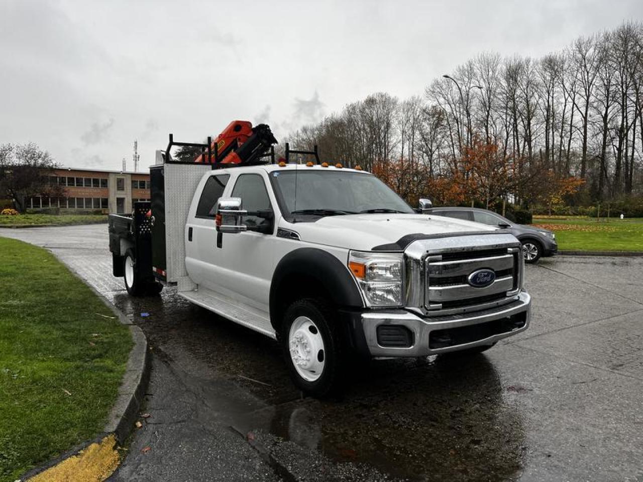 Used 2014 Ford F-550 Flat Deck With Crane 4WD for sale in Burnaby, BC