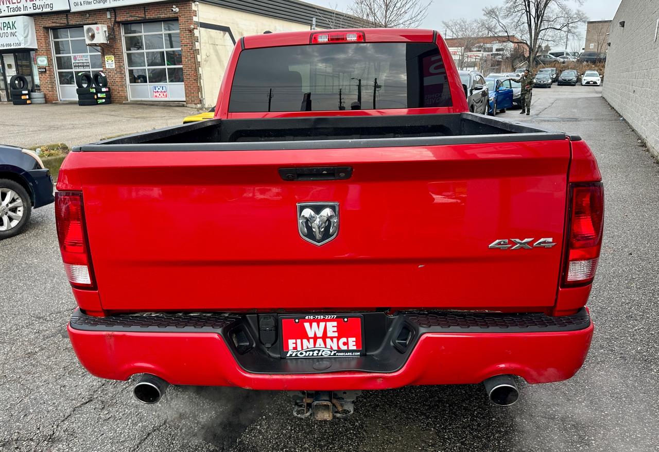 2017 RAM 1500 4WD QUAD CAB 140.5" ST Photo4