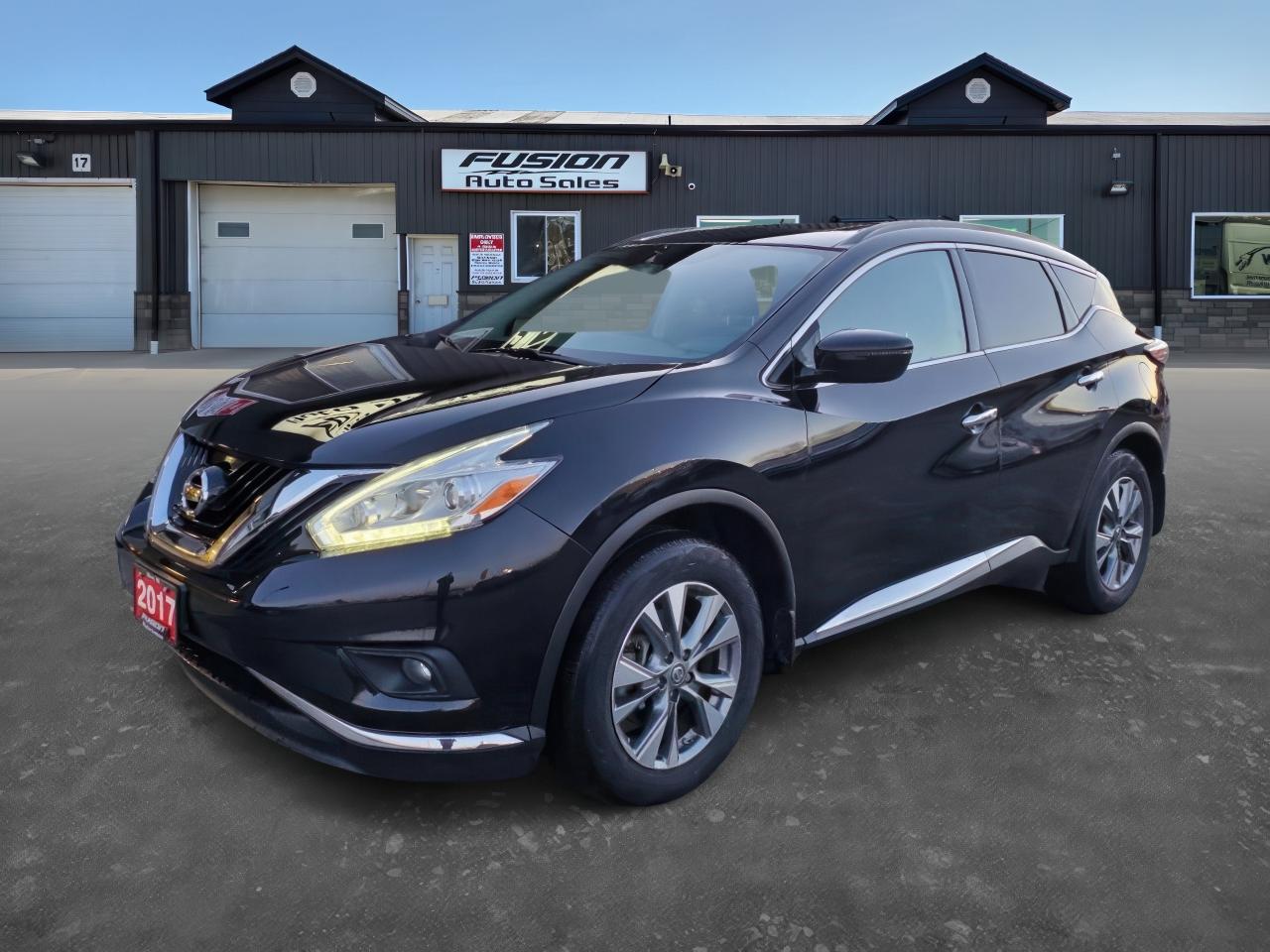 <p>DEMO UNIT PLEASE CALL FOR APPOINTMENT.</p><p>3.5LV6, Auto, AWD, Navigation, Power Panoramic Sunroof with Power Sunshade, Remote Start, Heated Seats & Steering Wheel, Back Up Camera, Power Rear Liftgate, Power Drivers Seat, Information System, Audio Steering Wheel Controls, Touch Screen, Push Button Start/Stop(Keyless Go) and more. Lic & HST Extra.</p><p style=box-sizing: border-box; --tw-border-spacing-x: 0; --tw-border-spacing-y: 0; --tw-translate-x: 0; --tw-translate-y: 0; --tw-rotate: 0; --tw-skew-x: 0; --tw-skew-y: 0; --tw-scale-x: 1; --tw-scale-y: 1; --tw-scroll-snap-strictness: proximity; --tw-ring-offset-width: 0px; --tw-ring-offset-color: #fff; --tw-ring-color: rgb(59 130 246 / 0.5); --tw-ring-offset-shadow: 0 0 #0000; --tw-ring-shadow: 0 0 #0000; --tw-shadow: 0 0 #0000; --tw-shadow-colored: 0 0 #0000; margin: 0px 0px 1.25em; color: #374151; font-family: Inter, ui-sans-serif, system-ui, sans-serif, Apple Color Emoji, Segoe UI Emoji, Segoe UI Symbol, Noto Color Emoji; font-size: 14px; background-color: #ffffff; border: 0px solid #e4e4e7;>Looking for a stylish and spacious SUV thats perfect for any adventure? Look no further than this 2017 Nissan Murano SV, now available at Fusion Auto Sales. This black beauty boasts a sleek exterior and a luxurious black interior, offering comfort and style in equal measure. The powerful 3.5L V6 engine delivers a smooth and responsive ride, while the all-wheel drive system ensures confident handling in all conditions. With 83,783 km on the odometer, this Murano is ready to take you wherever you need to go.</p><p style=box-sizing: border-box; --tw-border-spacing-x: 0; --tw-border-spacing-y: 0; --tw-translate-x: 0; --tw-translate-y: 0; --tw-rotate: 0; --tw-skew-x: 0; --tw-skew-y: 0; --tw-scale-x: 1; --tw-scale-y: 1; --tw-scroll-snap-strictness: proximity; --tw-ring-offset-width: 0px; --tw-ring-offset-color: #fff; --tw-ring-color: rgb(59 130 246 / 0.5); --tw-ring-offset-shadow: 0 0 #0000; --tw-ring-shadow: 0 0 #0000; --tw-shadow: 0 0 #0000; --tw-shadow-colored: 0 0 #0000; margin: 1.25em 0px; color: #374151; font-family: Inter, ui-sans-serif, system-ui, sans-serif, Apple Color Emoji, Segoe UI Emoji, Segoe UI Symbol, Noto Color Emoji; font-size: 14px; background-color: #ffffff; border: 0px solid #e4e4e7;>Step inside and experience the comfort of heated seats and steering wheel, perfect for those chilly Canadian mornings. Enjoy your favorite tunes with the SiriusXM radio or connect your phone via Bluetooth to stay connected on the go. The Murano also features a spacious interior with folding rear seats, providing plenty of room for passengers and cargo. And with its impressive array of safety features, including anti-lock brakes, air bags, and a rearview camera, you can be confident in the safety of your family.</p><p style=box-sizing: border-box; --tw-border-spacing-x: 0; --tw-border-spacing-y: 0; --tw-translate-x: 0; --tw-translate-y: 0; --tw-rotate: 0; --tw-skew-x: 0; --tw-skew-y: 0; --tw-scale-x: 1; --tw-scale-y: 1; --tw-scroll-snap-strictness: proximity; --tw-ring-offset-width: 0px; --tw-ring-offset-color: #fff; --tw-ring-color: rgb(59 130 246 / 0.5); --tw-ring-offset-shadow: 0 0 #0000; --tw-ring-shadow: 0 0 #0000; --tw-shadow: 0 0 #0000; --tw-shadow-colored: 0 0 #0000; margin: 1.25em 0px; color: #374151; font-family: Inter, ui-sans-serif, system-ui, sans-serif, Apple Color Emoji, Segoe UI Emoji, Segoe UI Symbol, Noto Color Emoji; font-size: 14px; background-color: #ffffff; border: 0px solid #e4e4e7;><span style=box-sizing: border-box; --tw-border-spacing-x: 0; --tw-border-spacing-y: 0; --tw-translate-x: 0; --tw-translate-y: 0; --tw-rotate: 0; --tw-skew-x: 0; --tw-skew-y: 0; --tw-scale-x: 1; --tw-scale-y: 1; --tw-scroll-snap-strictness: proximity; --tw-ring-offset-width: 0px; --tw-ring-offset-color: #fff; --tw-ring-color: rgb(59 130 246 / 0.5); --tw-ring-offset-shadow: 0 0 #0000; --tw-ring-shadow: 0 0 #0000; --tw-shadow: 0 0 #0000; --tw-shadow-colored: 0 0 #0000; font-weight: 600; color: var(--tw-prose-bold); border: 0px solid #e4e4e7;>Here are five of the Muranos most sizzling features:</span></p><ul style=box-sizing: border-box; --tw-border-spacing-x: 0; --tw-border-spacing-y: 0; --tw-translate-x: 0; --tw-translate-y: 0; --tw-rotate: 0; --tw-skew-x: 0; --tw-skew-y: 0; --tw-scale-x: 1; --tw-scale-y: 1; --tw-scroll-snap-strictness: proximity; --tw-ring-offset-width: 0px; --tw-ring-offset-color: #fff; --tw-ring-color: rgb(59 130 246 / 0.5); --tw-ring-offset-shadow: 0 0 #0000; --tw-ring-shadow: 0 0 #0000; --tw-shadow: 0 0 #0000; --tw-shadow-colored: 0 0 #0000; margin: 1.25em 0px; padding-inline-start: 1.625em; color: #374151; font-family: Inter, ui-sans-serif, system-ui, sans-serif, Apple Color Emoji, Segoe UI Emoji, Segoe UI Symbol, Noto Color Emoji; font-size: 14px; background-color: #ffffff; border: 0px solid #e4e4e7;><li style=box-sizing: border-box; --tw-border-spacing-x: 0; --tw-border-spacing-y: 0; --tw-translate-x: 0; --tw-translate-y: 0; --tw-rotate: 0; --tw-skew-x: 0; --tw-skew-y: 0; --tw-scale-x: 1; --tw-scale-y: 1; --tw-scroll-snap-strictness: proximity; --tw-ring-offset-width: 0px; --tw-ring-offset-color: #fff; --tw-ring-color: rgb(59 130 246 / 0.5); --tw-ring-offset-shadow: 0 0 #0000; --tw-ring-shadow: 0 0 #0000; --tw-shadow: 0 0 #0000; --tw-shadow-colored: 0 0 #0000; margin: 0.5em 0px; padding-inline-start: 0.375em; border: 0px solid #e4e4e7;><span style=box-sizing: border-box; --tw-border-spacing-x: 0; --tw-border-spacing-y: 0; --tw-translate-x: 0; --tw-translate-y: 0; --tw-rotate: 0; --tw-skew-x: 0; --tw-skew-y: 0; --tw-scale-x: 1; --tw-scale-y: 1; --tw-scroll-snap-strictness: proximity; --tw-ring-offset-width: 0px; --tw-ring-offset-color: #fff; --tw-ring-color: rgb(59 130 246 / 0.5); --tw-ring-offset-shadow: 0 0 #0000; --tw-ring-shadow: 0 0 #0000; --tw-shadow: 0 0 #0000; --tw-shadow-colored: 0 0 #0000; font-weight: 600; color: var(--tw-prose-bold); border: 0px solid #e4e4e7;>All-Wheel Drive:</span> Take on any weather condition with confidence.</li><li style=box-sizing: border-box; --tw-border-spacing-x: 0; --tw-border-spacing-y: 0; --tw-translate-x: 0; --tw-translate-y: 0; --tw-rotate: 0; --tw-skew-x: 0; --tw-skew-y: 0; --tw-scale-x: 1; --tw-scale-y: 1; --tw-scroll-snap-strictness: proximity; --tw-ring-offset-width: 0px; --tw-ring-offset-color: #fff; --tw-ring-color: rgb(59 130 246 / 0.5); --tw-ring-offset-shadow: 0 0 #0000; --tw-ring-shadow: 0 0 #0000; --tw-shadow: 0 0 #0000; --tw-shadow-colored: 0 0 #0000; margin: 0.5em 0px; padding-inline-start: 0.375em; border: 0px solid #e4e4e7;><span style=box-sizing: border-box; --tw-border-spacing-x: 0; --tw-border-spacing-y: 0; --tw-translate-x: 0; --tw-translate-y: 0; --tw-rotate: 0; --tw-skew-x: 0; --tw-skew-y: 0; --tw-scale-x: 1; --tw-scale-y: 1; --tw-scroll-snap-strictness: proximity; --tw-ring-offset-width: 0px; --tw-ring-offset-color: #fff; --tw-ring-color: rgb(59 130 246 / 0.5); --tw-ring-offset-shadow: 0 0 #0000; --tw-ring-shadow: 0 0 #0000; --tw-shadow: 0 0 #0000; --tw-shadow-colored: 0 0 #0000; font-weight: 600; color: var(--tw-prose-bold); border: 0px solid #e4e4e7;>Heated Seats and Steering Wheel:</span> Enjoy a comfortable ride even on the coldest days.</li><li style=box-sizing: border-box; --tw-border-spacing-x: 0; --tw-border-spacing-y: 0; --tw-translate-x: 0; --tw-translate-y: 0; --tw-rotate: 0; --tw-skew-x: 0; --tw-skew-y: 0; --tw-scale-x: 1; --tw-scale-y: 1; --tw-scroll-snap-strictness: proximity; --tw-ring-offset-width: 0px; --tw-ring-offset-color: #fff; --tw-ring-color: rgb(59 130 246 / 0.5); --tw-ring-offset-shadow: 0 0 #0000; --tw-ring-shadow: 0 0 #0000; --tw-shadow: 0 0 #0000; --tw-shadow-colored: 0 0 #0000; margin: 0.5em 0px; padding-inline-start: 0.375em; border: 0px solid #e4e4e7;><span style=box-sizing: border-box; --tw-border-spacing-x: 0; --tw-border-spacing-y: 0; --tw-translate-x: 0; --tw-translate-y: 0; --tw-rotate: 0; --tw-skew-x: 0; --tw-skew-y: 0; --tw-scale-x: 1; --tw-scale-y: 1; --tw-scroll-snap-strictness: proximity; --tw-ring-offset-width: 0px; --tw-ring-offset-color: #fff; --tw-ring-color: rgb(59 130 246 / 0.5); --tw-ring-offset-shadow: 0 0 #0000; --tw-ring-shadow: 0 0 #0000; --tw-shadow: 0 0 #0000; --tw-shadow-colored: 0 0 #0000; font-weight: 600; color: var(--tw-prose-bold); border: 0px solid #e4e4e7;>SiriusXM Radio:</span> Stay entertained with your favorite music and channels.</li><li style=box-sizing: border-box; --tw-border-spacing-x: 0; --tw-border-spacing-y: 0; --tw-translate-x: 0; --tw-translate-y: 0; --tw-rotate: 0; --tw-skew-x: 0; --tw-skew-y: 0; --tw-scale-x: 1; --tw-scale-y: 1; --tw-scroll-snap-strictness: proximity; --tw-ring-offset-width: 0px; --tw-ring-offset-color: #fff; --tw-ring-color: rgb(59 130 246 / 0.5); --tw-ring-offset-shadow: 0 0 #0000; --tw-ring-shadow: 0 0 #0000; --tw-shadow: 0 0 #0000; --tw-shadow-colored: 0 0 #0000; margin: 0.5em 0px; padding-inline-start: 0.375em; border: 0px solid #e4e4e7;><span style=box-sizing: border-box; --tw-border-spacing-x: 0; --tw-border-spacing-y: 0; --tw-translate-x: 0; --tw-translate-y: 0; --tw-rotate: 0; --tw-skew-x: 0; --tw-skew-y: 0; --tw-scale-x: 1; --tw-scale-y: 1; --tw-scroll-snap-strictness: proximity; --tw-ring-offset-width: 0px; --tw-ring-offset-color: #fff; --tw-ring-color: rgb(59 130 246 / 0.5); --tw-ring-offset-shadow: 0 0 #0000; --tw-ring-shadow: 0 0 #0000; --tw-shadow: 0 0 #0000; --tw-shadow-colored: 0 0 #0000; font-weight: 600; color: var(--tw-prose-bold); border: 0px solid #e4e4e7;>Spacious Interior:</span> Enjoy ample passenger and cargo space for your adventures.</li><li style=box-sizing: border-box; --tw-border-spacing-x: 0; --tw-border-spacing-y: 0; --tw-translate-x: 0; --tw-translate-y: 0; --tw-rotate: 0; --tw-skew-x: 0; --tw-skew-y: 0; --tw-scale-x: 1; --tw-scale-y: 1; --tw-scroll-snap-strictness: proximity; --tw-ring-offset-width: 0px; --tw-ring-offset-color: #fff; --tw-ring-color: rgb(59 130 246 / 0.5); --tw-ring-offset-shadow: 0 0 #0000; --tw-ring-shadow: 0 0 #0000; --tw-shadow: 0 0 #0000; --tw-shadow-colored: 0 0 #0000; margin: 0.5em 0px; padding-inline-start: 0.375em; border: 0px solid #e4e4e7;><span style=box-sizing: border-box; --tw-border-spacing-x: 0; --tw-border-spacing-y: 0; --tw-translate-x: 0; --tw-translate-y: 0; --tw-rotate: 0; --tw-skew-x: 0; --tw-skew-y: 0; --tw-scale-x: 1; --tw-scale-y: 1; --tw-scroll-snap-strictness: proximity; --tw-ring-offset-width: 0px; --tw-ring-offset-color: #fff; --tw-ring-color: rgb(59 130 246 / 0.5); --tw-ring-offset-shadow: 0 0 #0000; --tw-ring-shadow: 0 0 #0000; --tw-shadow: 0 0 #0000; --tw-shadow-colored: 0 0 #0000; font-weight: 600; color: var(--tw-prose-bold); border: 0px solid #e4e4e7;>Safety Features:</span> Drive with peace of mind with an impressive suite of safety technology.</li></ul><p style=box-sizing: border-box; --tw-border-spacing-x: 0; --tw-border-spacing-y: 0; --tw-translate-x: 0; --tw-translate-y: 0; --tw-rotate: 0; --tw-skew-x: 0; --tw-skew-y: 0; --tw-scale-x: 1; --tw-scale-y: 1; --tw-scroll-snap-strictness: proximity; --tw-ring-offset-width: 0px; --tw-ring-offset-color: #fff; --tw-ring-color: rgb(59 130 246 / 0.5); --tw-ring-offset-shadow: 0 0 #0000; --tw-ring-shadow: 0 0 #0000; --tw-shadow: 0 0 #0000; --tw-shadow-colored: 0 0 #0000; margin: 1.25em 0px; color: #374151; font-family: Inter, ui-sans-serif, system-ui, sans-serif, Apple Color Emoji, Segoe UI Emoji, Segoe UI Symbol, Noto Color Emoji; font-size: 14px; background-color: #ffffff; border: 0px solid #e4e4e7;>Call Fusion Auto Sales today to schedule an appointment and experience the luxurious comfort and performance of this 2017 Nissan Murano SV for yourself.</p><p>The Fusion Philosophy<br /><br />At Fusion Auto Sales, we put more effort into buying our vehicles than we do trying to sell them. By constantly monitoring what other car lots are doing, we strive to be the lowest priced dealer in our market. We won’t purchase a vehicle to “fill a hole”. We know that the vehicles on our lot are great value for the money and smart shoppers realize that also. Adhering to this philosophy makes it easy for our customers. If they find a vehicle on our lot that fulfills their needs and wants, they know that they’re getting great value. <br /><br />If we don’t have what you’re looking for, we can find it! Over 150 customers have saved thousands of dollars buy joining our” locate club”. People that know what they want and what they want to pay (within reason of course), get the vehicle of their dreams and enjoy huge savings. Contact us for details.<br /><br /><br /><br />Fusion Auto Sales is in Tilbury, Ont. located between Windsor and London right off the 401. We are among 7 dealerships within a &frac12; kilometer distance which is great for out of town shoppers. We began satisfying customers in 2009 and have been doing so ever since. In 2012 Fusion was recognized as 1 of the 50 fastest growing companies in Canada. And then, in 2018, we were named one of the top 5 independent automobile dealerships in the country. <br /><br />We specialize in late model vehicles at below than average pricing, everything is fully certified and every unit is Car Proof verified and is fully disclosed with every unit. We offer every type of financing from perfect credit at great rates to credit challenges with competitive rates. We also specialize in locating vehicles for customers, we cant have everything on the lot so if you do not see it and are having a hard time finding what you are looking for, let us know and we can find it for you. Fusion Auto Sales spans its customer base from Windsor all the way to Timmins, On and every where in between. Our philosophy is You are going to like the way we deal and everyone does, straight honest answers with no monkey business and no back and forth between sales and managers.</p><p> </p>