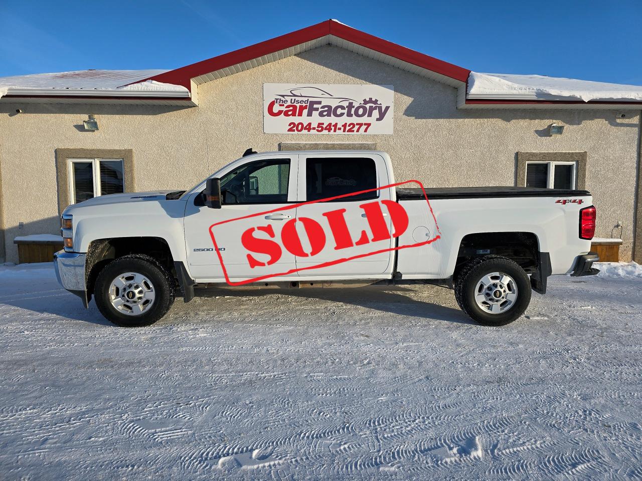 <p>***SOLD***</p><p>Looking for a reliable and capable heavy-duty truck? Look no further than this Accident Free, 2019 Chevrolet Silverado 2500 LT Crew Cab at The Used Car Factory. With its powerful 6.6L Duramax V8 diesel engine, this Silverado is ready to tackle any job. It comes equipped with 4-wheel drive, making it perfect for navigating challenging terrain and hauling heavy loads.</p><p>This Silverado features a spacious and comfortable crew cab with black cloth interior, perfect for accommodating passengers or hauling cargo. It also boasts a long list of desirable features including air conditioning, heated mirrors, power windows, and cruise control.</p><p>This Silverado is a great option for those seeking a durable and dependable work truck or a family vehicle that can handle the demands of everyday life. With only 128,064 km on the odometer, this truck is not going to last long.</p><ol><li><strong>Powerful Duramax V8 Diesel Engine:</strong> This truck is built for power and performance, ready to handle the toughest tasks.</li><li><strong>Allison 6 Speed Automatic Transmission:  </strong>Smooth shifting, proven reliability. </li><li><strong>Spacious Crew Cab:</strong> Enjoy ample room for 6 passengers and cargo with the comfortable crew cab design.</li><li><strong>4-Wheel Drive:</strong> Conquer any terrain with the confidence of 4-wheel drive capability.</li><li><strong>Loaded with Features:</strong> This Silverado is equipped with a long list of features that make it a pleasure to drive.</li></ol><p>We offer on -the- spot financing; we finance all levels of credit. Several Warranty Options Available,</p><p>All our vehicles come with a Manitoba safety. Proud members of The Manitoba Used Car Dealer Association as well as the Manitoba Chamber of Commerce.</p><p>All payments, and prices, are plus applicable taxes. The Used Car Factorys Dealers permit is #4821</p>