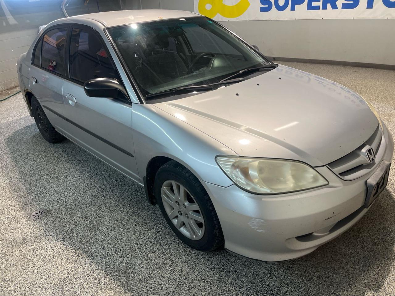 Used 2004 Honda Civic *** AS-IS SALE *** Keyless Entry * Manually Adjustable Steering * A/C * CD/FM/AM * AntiTheft System * Tinted Windows * Cloth Seats * Winter Tires On * for sale in Cambridge, ON