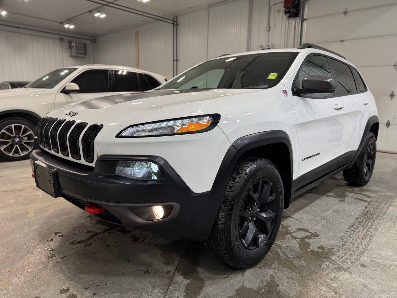 <p>AMERIKAL AUTO  3160 WILKES AVENUE, WINNIPEG MANITOBA.</p><p>ALL PREMIUM PRE-OWNED VEHICLES.</p><p>PLEASE CALL THE NUMBER OR TEXT 2049905659 PRIOR TO COMING IN.</p><p>2018 JEEP CHEROKEE TRAILHAWK FULLY LOADED 3.2L 6 CYLINDER 5 passenger with 187,500kms, automatic transmission, keyless entry, PUSH TO START, FACTORY COMMAND START, HEATED LEATHER seating FRONT AND BACK, HEATED STEERING WHEEL, FRONT COOLED/AC/VENTED SEATS, REAR VIEW CAMERA, REAR PARK SENSORS, traction control, cruise control, power locks, power steering, power windows, BIG TOUCH SCREEN, GPS/NAVIGATION SYSTEM, AM/FM/CD/MP3/AUX/USB/BLUETOOTH player, CLEAN TITLE, COMES SAFETIED, AND WILL BE READY TO GO and much more! We at AMERIKAL AUTO are professional, and we offer a no-pressure, hassle-free, and family-oriented environment. We are here to help you. Bank Financing Available! The price you see is the price you pay! Only $17,999 + taxes. Dealers permit #4780.</p><p>Every vehicle we have comes with a Manitoba Certified Safety Inspection and a carproof/carfax history report.</p>