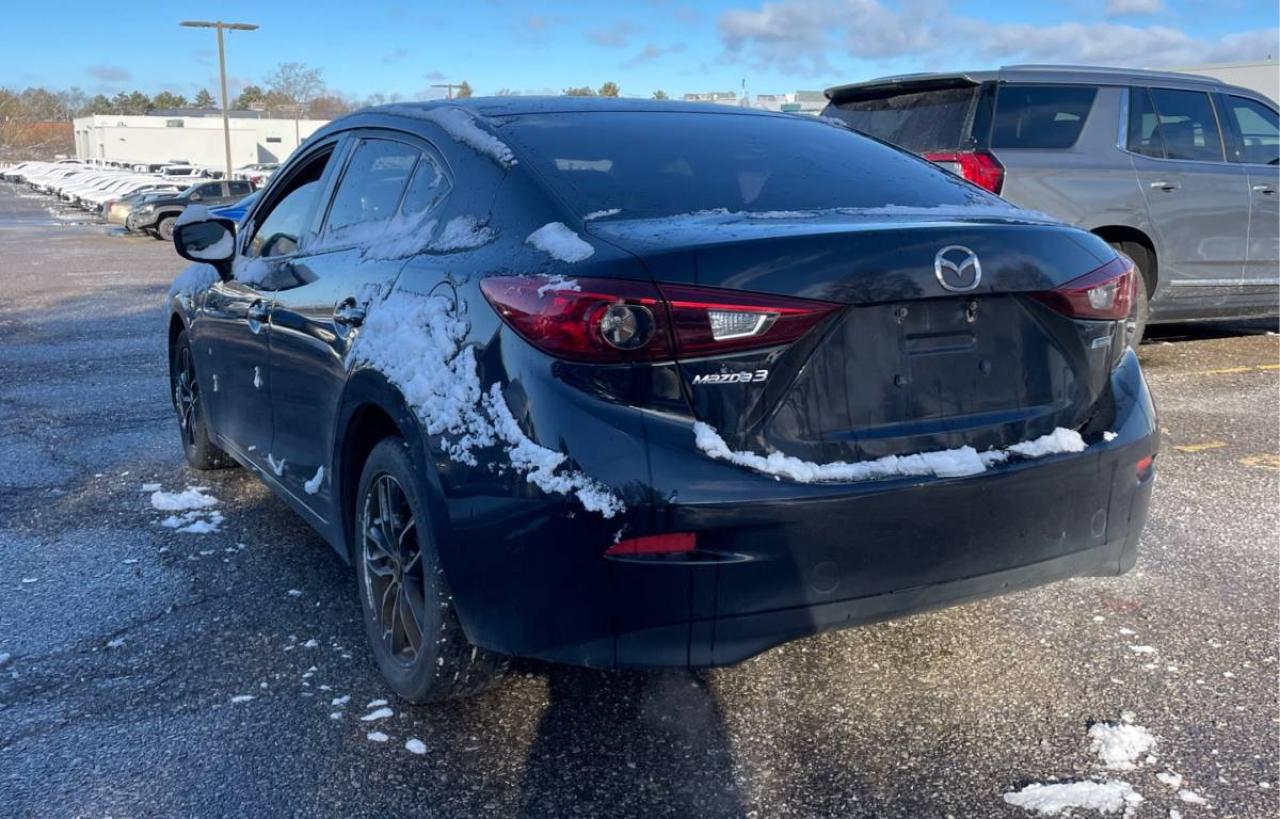 2015 Mazda MAZDA3 4dr Sdn Auto GX Photo3