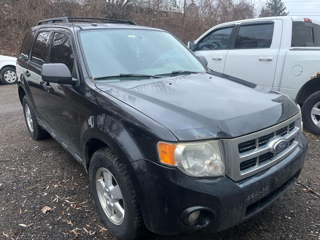 Used 2011 Ford Escape *** AS-IS SALE ***  Keyless Entry * Powered By Microsoft * Power Locks Windows Side View Mirrors * Door Keypad Lock System * Roof Rails * Heated Side for sale in Cambridge, ON