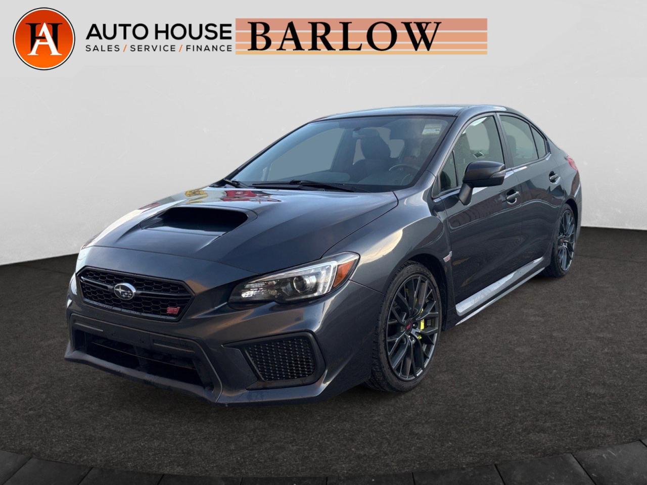 <div>2019 SUBARU WRX STI SPORT-TECH 2.0L W/LID SPOILER WITH 95249 KMS, MANUAL, NAVIGATION, BACKUP CAMERA, SUNROOF, BLIND SPOT DETECTION, DRIVE MODES, LEATHER/CLOTH SEATS, HEATED SEATS, PUSH-BUTTON START, APPLE CAR PLAY, ANDROID AUTO, BLUETOOTH, USB/AUX AND MORE!</div><div> </div><div>.<br />ALL CREDIT ACCEPTED!<br />One month at a job? Bankruptcy? New to Canada? Collections? Student or work visas? Previous repossessions? Good or bad credit? Weve got you covered! Get pre-approved today at www.autoshouse.com!<br /><br />What We Offer:<br /><br />*Low Bi-Weekly Payments<br />*Instant Approvals<br />*Credit Consolidation<br />*Employment Insurance<br />*Negative Equity Coverage<br /><br />Operating Hours:<br />Mon-Thurs: 10 am -- 8 pm<br />Fri-Sat: 10 am -- 6 pm<br /><br />Call 403-263-4446! All vehicles come with a full mechanical fitness assessment and CARFAX report.<br /><br />Referral Program:<br />Refer friends and family and earn $500 for each referral!<br /><br />AMVIC Licensed Dealer<br /><br />After a credit check, we can determine payments, APR, terms, and interest rates based on your credit (O.A.C). Individual credit will affect bi-weekly payments and the total cost of credit . Newer Vehicles May Come With Apple Carplay, Android Auto. Similar to Chevrolet, GMC, Honda, Toyota, Cadillac, Nissan, Ford, Volvo 2007, 2008, 2009, 2010, 2011, 2012, 2013, 2014, 2015, 2016, 2017, 2018<br /><br />Location: 2404 23rd Ave. N.E. Calgary AB, T2E 8J4<br />CARFAX IS AVAILABLE TO THE CONSUMER.<br />All photos are of the vehicle featured in the advertisement.</div>