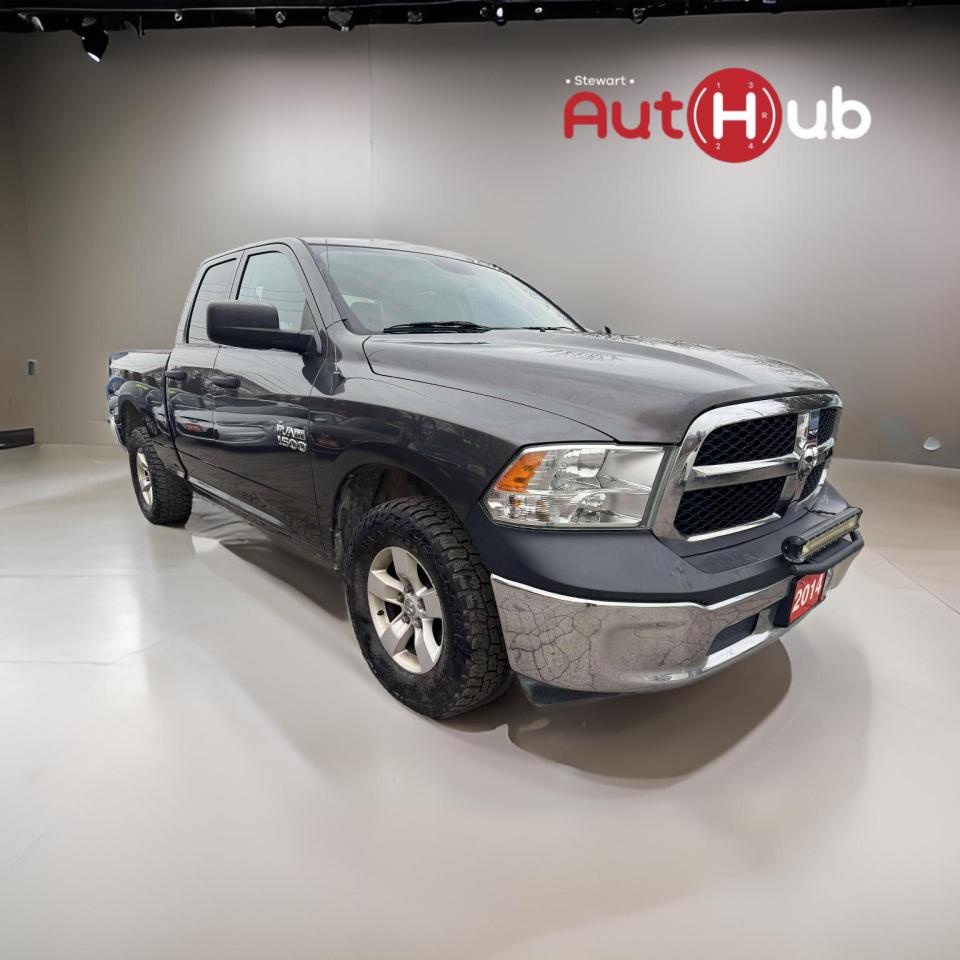 Used 2014 RAM 1500 4WD QUAD CAB 140.5