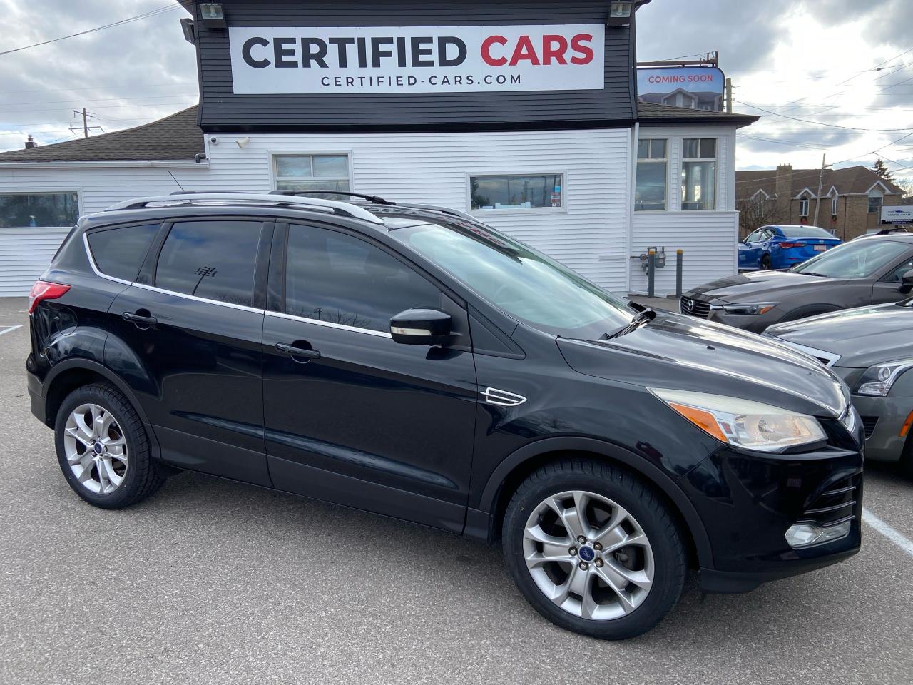 <div>NEW TIRES * BLUETOOTH * REMOTE START * HEATED LEATHER SEATS * REVERSE CAMERA * REVERSE PARK DISTANCE SENSORS * DUAL AUTO CLIMATE CONTROL * 3 POSITION MEMORY DRIVER SEAT * SUNROOF * 2.0L 4 CYL., AUTO, AWD, TITANIUM * POWER LOCKS, WINDOWS, MIRRORS, SEAT, LIFT GATE, SUNROOF & KEYLESS ENTRY * PROXIMITY KEY w/ PUSH BUTTON START * TILT & TELESCOPIC STEERING WHEEL * ABS & TRACTION CONTROL * STEERING WHEEL MOUNTED CRUISE & STEREO CONTROLS * 18 ALLOY WHEELS ON NEW TIRES * </div><div> </div><div>INCLUDED IN YOUR PURCHASE IS A SAFETY CERTIFICATION, FRESH OIL CHANGE, AND A 60-DAY LIMITED POWERTRAIN GUARANTEE. WE ALSO OFFER EXTENDED WARRANTIES FOR ADDED PEACE OF MIND.<br /><br /></div><div>REGARDLESS OF YOUR CREDIT HISTORY, WE PROVIDE FINANCING OPTIONS FOR ALL CREDIT TYPES. NOT ALL VEHICLES QUALIFY FOR FINANCING. CONTACT DEALER FOR DETAILS.<br />VISIT OUR WEBSITE AT WWW.CERTIFIED-CARS.COM TO EXPLORE OUR INVENTORY OF USED CARS, TRUCKS, AND SUVS. </div><div> </div><div>LOCATED IN THE NIAGARA REGION, WE ARE PROUD TO SERVE CUSTOMERS FROM ST. CATHARINES, NIAGARA FALLS, WELLAND, PORT COLBORNE, HAMILTON, AND BEYOND. <br />OUR LOT FEATURES A VARIETY OF MAKES AND MODELS INCLUDING CHEVROLET, FORD, GMC, PONTIAC, BUICK, OLDSMOBILE, CADILLAC, DODGE, CHRYSLER, SATURN, MAZDA, TOYOTA, HONDA, BMW, AUDI, MERCEDES BENZ, NISSAN, AND HYUNDAI. WITH AN EXTENSIVE INVENTORY OF UP TO 100 VEHICLES, WE ARE CONFIDENT YOU WILL FIND THE PERFECT VEHICLE FOR YOUR NEEDS</div><p>This 2014 Ford Escape Titanium AWD is a stylish and practical SUV thats ready for adventure. With its sleek black exterior and luxurious black leather interior, it turns heads wherever it goes. The Titanium trim level boasts a comprehensive set of features, including heated leather seats, a power liftgate, and a panoramic sunroof, making every journey a comfortable and enjoyable experience.</p><p>Under the hood, the 2.0L I4 engine delivers reliable power, while the all-wheel drive system provides enhanced traction for all weather conditions. The Escape is also equipped with a host of advanced safety features, including a rearview camera, blind spot monitoring, and lane departure warning. With 182,470 km on the odometer, this Escape has plenty of life left in it.</p><p>At Certified Cars, we believe in providing our customers with high-quality pre-owned vehicles at competitive prices. Come down to our dealership today and see for yourself why the 2014 Ford Escape Titanium AWD is the perfect blend of style, comfort, and capability.</p><p><strong>Here are 5 of its most sizzling features:</strong></p><ol><li><strong>AWD System</strong>: Enjoy peace of mind knowing youre equipped for any weather conditions.</li><li><strong>Heated Leather Seats</strong>: Stay warm and comfortable on even the coldest days.</li><li><strong>Panoramic Sunroof</strong>: Let the sunshine in and enjoy the open air feeling.</li><li><strong>Power Liftgate</strong>: Effortlessly load and unload your cargo.</li><li><strong>Rearview Camera</strong>: Back up safely and easily with this essential safety feature.</li></ol><p><em>Powered by AutoIntelligence™ AI</em></p>