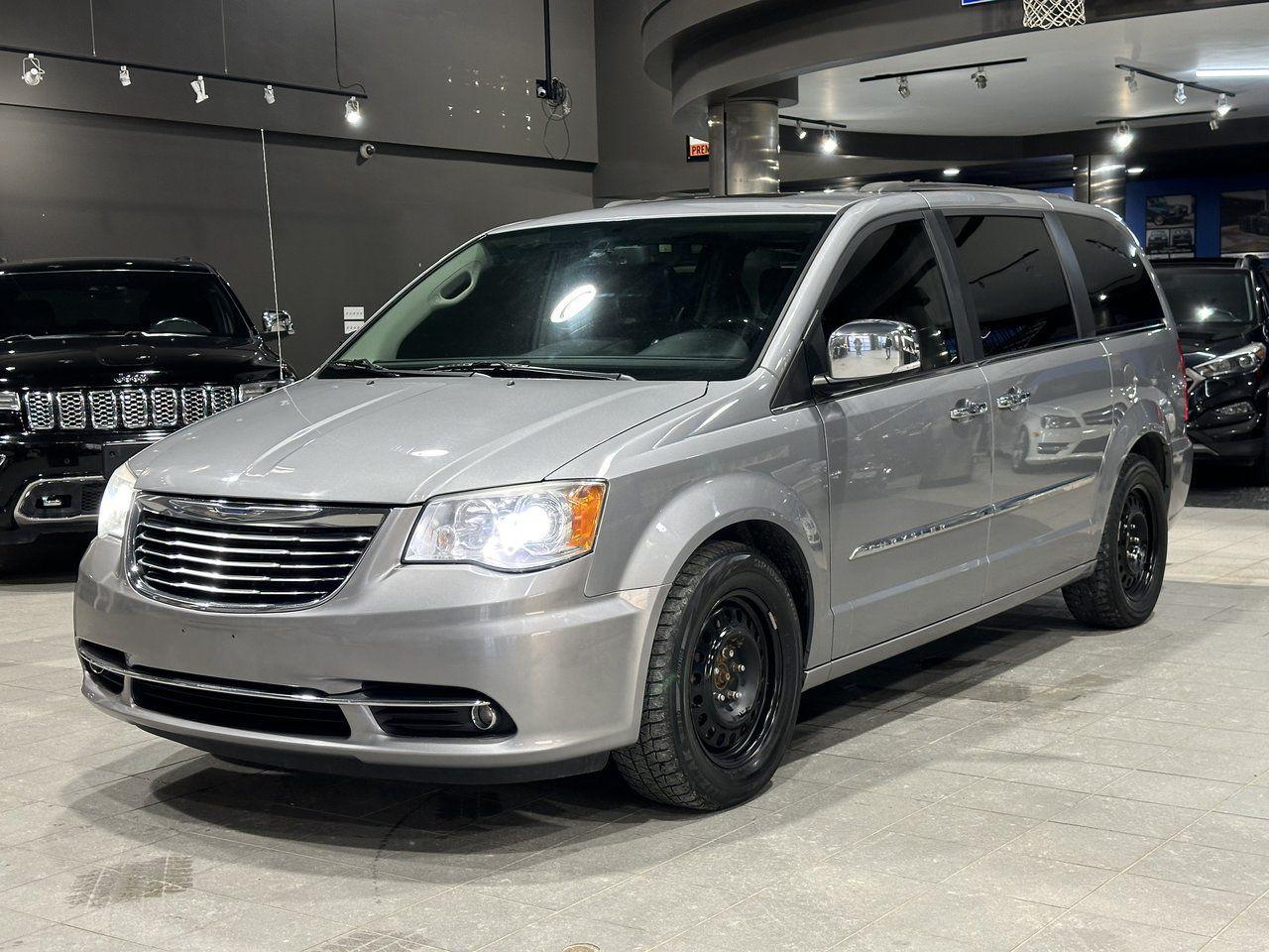 <p><strong>High Value Options:</strong></p><ul><li>Leather</li><li>Sunroof</li><li>DVD</li><li>Heated Seats</li><li>Stow and Go</li><li>Power Folding Seats</li></ul><p>The <strong>2014 Chrysler Town & Country Limited</strong> is a versatile and reliable minivan designed for families and long trips. Equipped with leather seats, it offers a luxurious and comfortable interior. The sunroof adds an airy, open feel to the cabin, while the DVD system ensures entertainment for passengers on the go. The heated seats are perfect for colder days, offering extra comfort. The Stow and Go seating allows for easy storage, providing flexible cargo space when needed. Power folding seats add extra convenience, allowing you to fold down the seats with the touch of a button. Known for its durability, efficiency, and practicality, the Chrysler Town & Country Limited is a perfect choice for drivers seeking a feature-rich and capable minivan.</p><p><strong>3 Month/5000 KM Powertrain Warranty on every vehicle!</strong> 3-month warranty price is included in the advertised price. Extended warranties available (extended warranty prices not included).<br>Every vehicle sold at Match is a clean title. We also provide a verified CarFax report for each vehicle.</p><p>Financing available; please visit <a rel=noopener target=_new><span><strong>www.matchautomarket.ca</strong></span></a>.<br><strong>Dealer permit:</strong> 4858<br><strong>Address:</strong> 231 Oak Point Hwy</p>