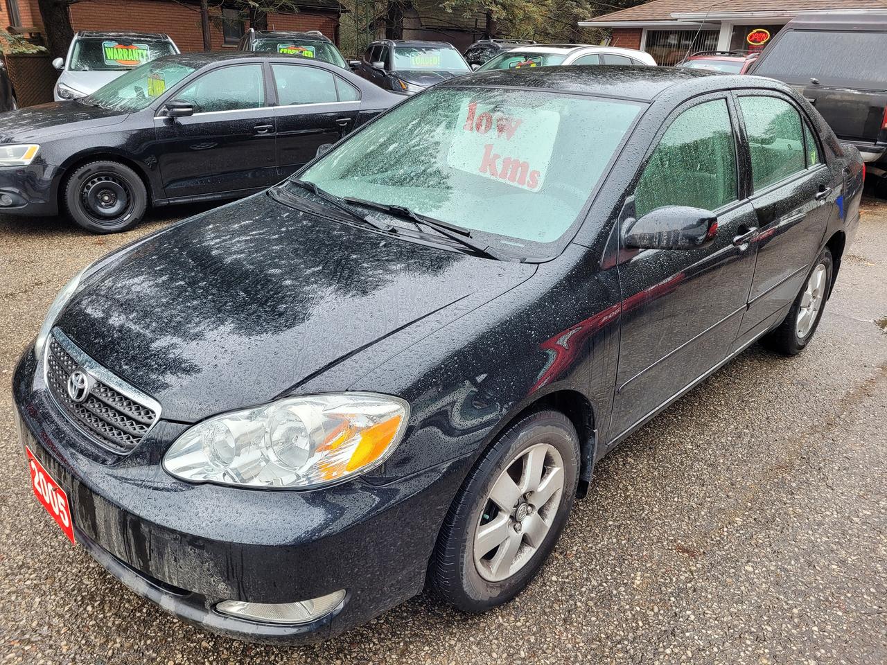 <p>One Owner, Accident Free, Certified, Financing Available & Trade-ins Welcome!</p><p>MICHELIN Harmony Tires.</p><p>Looking for a reliable and fuel-efficient sedan that wont break the bank? Look no further than this 2005 Toyota Corolla 4dr Sdn LE Auto, available now at Rockwood Motor Products. This sleek black beauty features a comfortable grey interior and boasts a 1.8L I4 engine thats perfect for navigating city streets or hitting the open road. With 112,000km on the odometer, this Corolla has plenty of life left in it.</p><p>This well-maintained vehicle comes equipped with a range of features designed to enhance your driving experience. Enjoy the convenience of power mirrors and steering, stay comfortable with the tilt steering wheel and bucket seats, and stay safe with the driver and passenger airbags.</p><p>Here are five of the features that will make you say Wow!</p><ul><li><strong>Sleek Black Exterior:</strong> Turn heads with this sharp and stylish sedan.</li><li><strong>Comfortable Grey Interior:</strong> Relax and enjoy the ride in a spacious and modern interior.</li><li><strong>Reliable 1.8L I4 Engine:</strong> Fuel efficiency meets power for a smooth and confident drive.</li><li><strong>Power Mirrors and Steering:</strong> Convenience at your fingertips.</li><li><strong>Driver and Passenger Airbags:</strong> Safety is paramount, so you can drive with peace of mind.</li></ul><p>Dont miss out on the chance to own this dependable and stylish Toyota Corolla. Visit Rockwood Motor Products today and take it for a test drive!</p><p><em>Powered by AutoIntelligence&trade; AI</em></p>