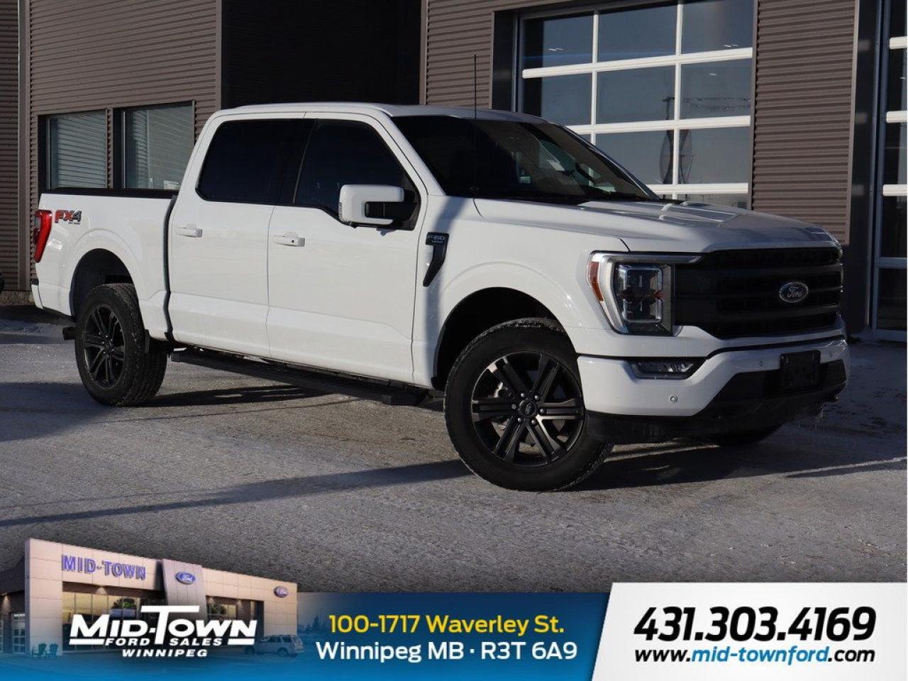 Recent Arrival!<BR><BR>One Owner |, Local Trade |, Clean Carfax |, Non Smoker |, Apple Carplay |, Android Auto |, 4WD, 360 Degree Camera, 4-Wheel Disc Brakes, 4x4 FX4 Off-Road Decal, 6 Bright Polished Running Board, 8 Speakers, ABS brakes, Accent-Colour Angular Step Bar, Adjustable pedals, Air Conditioning, Alloy wheels, AM/FM radio: SiriusXM with 360L, Auto High-beam Headlights, Auto Start-Stop Removal, Auto-dimming door mirrors, Auto-dimming Rear-View mirror, Automatic temperature control, Block heater, Body-Colour Door Handles w/Body-Colour Bezel, Body-Colour Front & Rear Bumpers, Box Side Decal, Brake assist, Chrome 2-Bar & 1 Minor Bar Style Grille, Chrome Door Handles w/Body-Colour Bezel, Chrome Single-Tip Exhaust, Chrome Skull Caps on Exterior Mirrors, Class IV Trailer Hitch Receiver, Compass, Connected Built-In Navigation, Dark 2-Bar & 1 Minor Bar Style Grille, Delay-off headlights, Driver door bin, Driver vanity mirror, Dual front impact airbags, Dual front side impact airbags, Electronic Locking w/3.73 Axle Ratio, Electronic Stability Control, Emergency communication system: SYNC 4 911 Assist, Equipment Group 502A High, Evasive Steering Assist, Exterior Parking Camera Rear, Ford Co-Pilot360 Assist 2.0, Front anti-roll bar, Front Bucket Seats, Front dual zone A/C, Front fog lights, Front reading lights, Front wheel independent suspension, Fully automatic headlights, FX4 Off-Road Package, Garage door transmitter, GVWR: 3,198 kg (7,050 lb) Payload Package, Heated door mirrors, Heated front seats, Heated Rear Seats, Heated Steering Wheel, Heavy-Duty Electric Parking Brake, Hill Descent Control, Illuminated entry, Intelligent Adaptive Cruise Control w/Stop & Go, Intersection Assist, Lariat Chrome Appearance Package, Lariat Sport Appearance Package, LED Projector w/Dynamic Bending Headlamps, Low tire pressure warning, Max Trailer Tow Package, Memory seat, Monotube Rear Shocks, Navigation System, Navigation system: Connected Navigation, Occupant sensing airbag, Off-Road Tuned Front Shock Absorbers, Outside temperature display, Overhead airbag, Overhead console, Panic alarm, Passenger door bin, Passenger vanity mirror, Pedal memory, Power door mirrors, Power driver seat, Power passenger seat, Power steering, Power Tailgate, Power Tilt/Telescoping Steering Column w/Memory, Power windows, Pro Trailer Backup Assist, Radio data system, Radio: B&O Sound System by Bang & Olufsen, Radio: B&O Unleashed Sound System by Bang & Olufsen, Rain-Sensing Wipers, Rear reading lights, Rear step bumper, Rear window defroster, Remote keyless entry, Rock Crawl Mode, Security system, Speed control, Speed Sign Recognition, Speed-sensing steering, Split folding rear seat, Steering wheel mounted audio controls, SYNC 4 w/Enhanced Voice Recognition, Tachometer, Telescoping steering wheel, Tilt steering wheel, Traction control, Trip computer, Turn signal indicator mirrors, Twin Panel Moonroof, Ventilated front seats, Voltmeter, Wheels: 18 6-Spoke Machined-Aluminum, Wheels: 18 Chrome-Like PVD, Wireless Charging Pad.<BR><BR>Odometer is 36818 kilometers below market average! Oxford White 2022 Ford F-150 Lariat LOW KMS 4WD 5.0L V8 10-Speed Automatic<BR><BR><BR>For further information please contact MidTown Ford sales department directly at 204-284-7650. Dealer #9695.