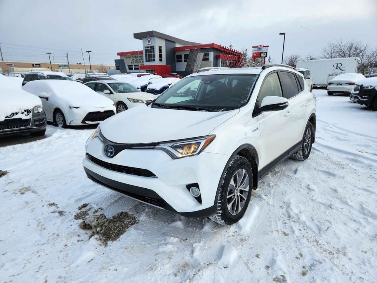 Used 2018 Toyota RAV4 AWD Hybrid LE for sale in Calgary, AB