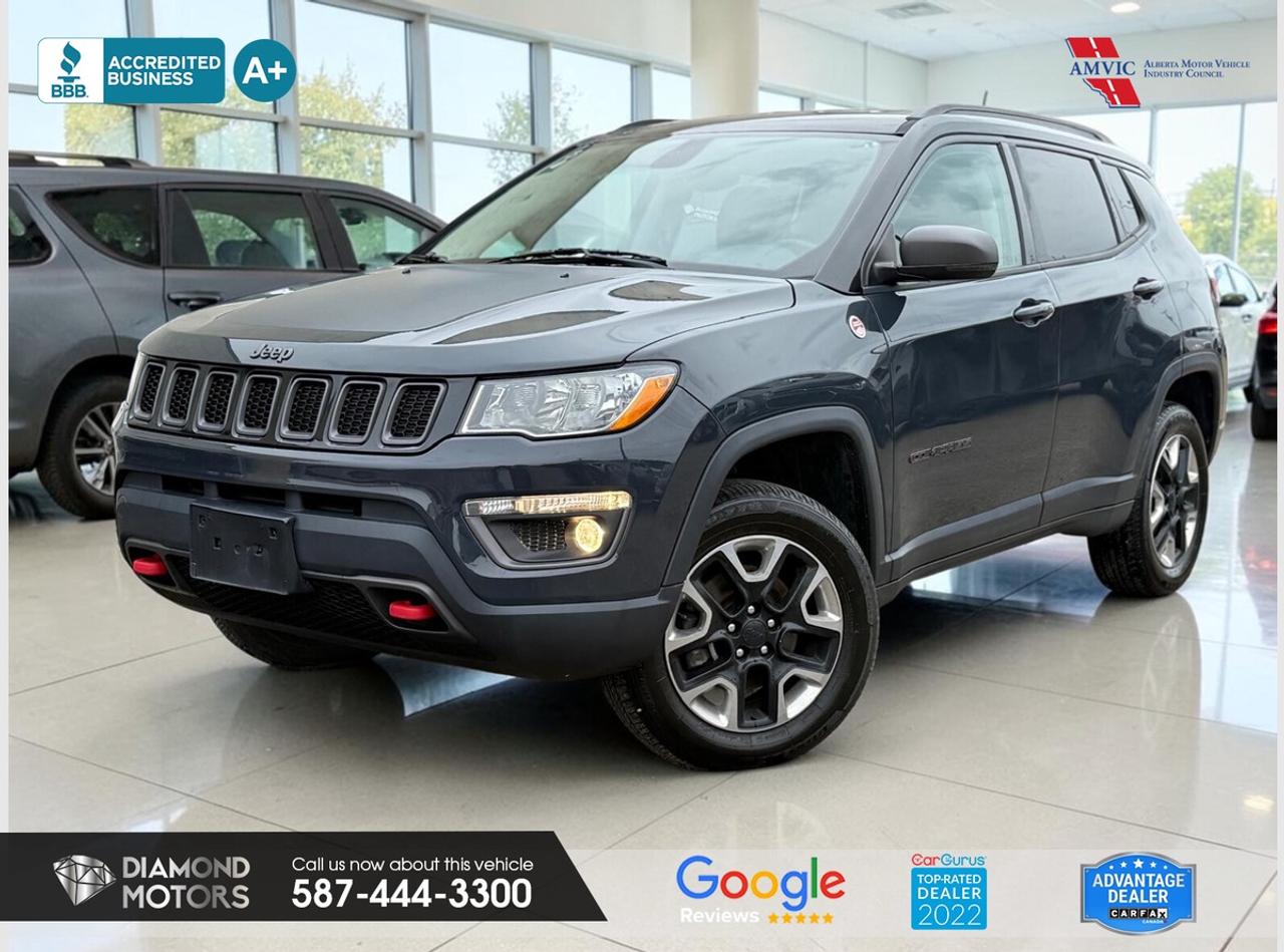 CLEARANCE PRICED  PRICED TO MOVE <br/> 2.4L 4 CYLINDER ENGINE, 4X4, LEATHER, NAVIGATION, HEATED SEATS, HEATED STEERING, BLUETOOTH, APPLE CARPLAY, BACKUP CAMERA, TRAILHAWK PACKAGE, CRUISE CONTROL, AND MUCH MORE! <br/> <br/> <br/> Just Arrived 2018 Jeep Compass Trailhawk 4x4 Grey has 125,409 KM on it. 2.4L 4 Cylinder Engine engine, Four-Wheel Drive, Automatic transmission, 5 Seater passengers, on special price for $15,900.00. <br/> <br/> <br/> Book your appointment today for Test Drive. We offer contactless Test drives & Virtual Walkarounds. Stock Number: 24307 <br/> isclosure: This vehicle was previously registered in BC. Vehicle has passed all required inspections in Alberta. <br/> The vehicle was in need of repairs as a result of an incident or collision that cost more than $3,000 including parts and labour. <br/> At Diamond Motors, we are dedicated to providing you with an outstanding car-buying experience, offering quality pre-owned vehicles at prices that fit your budget. Our transparent and honest approach means you can expect straightforward guidance without any high-pressure sales tactics. We believe in building lasting relationships with our customers by offering personalized service tailored to your needs. From the moment you step onto our lot, our team is here to support you every step of the way, ensuring you leave confident in your decision. Trust, integrity, and customer satisfaction are the foundation of everything we do. <br/> <br/> <br/> Why choose us? <br/> <br/> Certified Pre-Owned Vehicles <br/> Family Owned & Operated <br/> Finance Available <br/> Extended Warranty <br/> Vehicles Priced to Sell <br/> No Pressure Environment <br/> Inspection & Carfax Report <br/> Professionally Detailed Vehicles <br/> Full Disclosure Guaranteed <br/> AMVIC Licensed <br/> BBB Accredited Business <br/> CarGurus Top-rated Dealer 2022 & 2024 <br/> <br/> <br/> Phone to schedule an appointment @ 587-444-3300 or simply browse our inventory online www.diamondmotors.ca or come and see us at our location at <br/> 3403 93 street NW, Edmonton, T6E 6A4 <br/> <br/> <br/> To view the rest of our inventory: <br/> www.diamondmotors.ca/inventory <br/> <br/> <br/> This dealership provides all required disclosures in accordance with AMVIC regulations. A completed Mechanical Fitness Assessment and its associated inspection work order will be supplied with every vehicle. A Carfax (or equivalent) vehicle history report will also be provided, including available information on previous damage, accident history, stolen or salvage status, and jurisdictional records. <br/> Customers are encouraged to review all vehicle features, options, and equipment for accuracy prior to purchase. <br/>