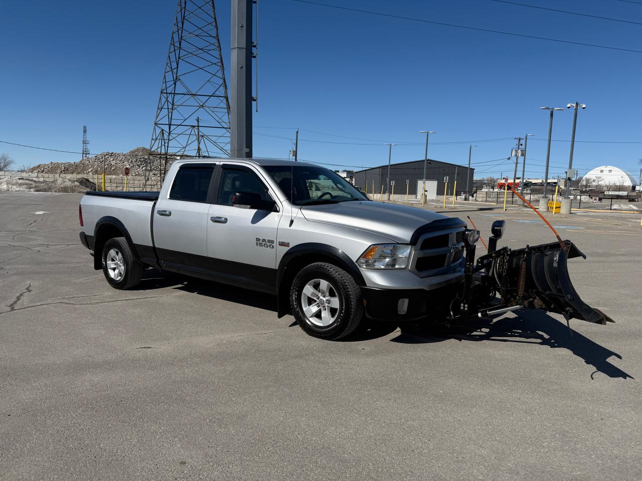 2016 RAM 1500 4WD Crew Cab 149" Plow & Truck. Photo2