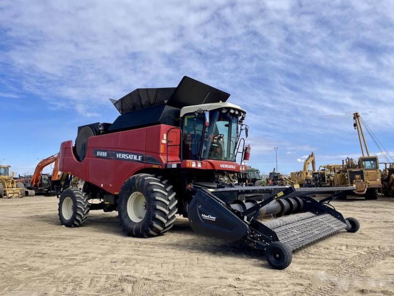 Used 2014 VERSATILE RT490 Combine Harvester with MacDon Draper Pickup for sale in Burnaby, BC
