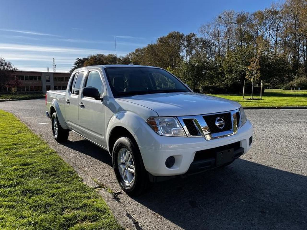 2015 Nissan Frontier SL Crew Cab 4WD, 4.0L, 6 cylinder, 4 door, automatic, 4WD, 4-Wheel ABS, cruise control, air conditioning, AM/FM radio, power door locks, power windows, power mirrors, white exterior, black interior, cloth.  $23,850.00 plus $375 processing fee, $24,225.00 total payment obligation before taxes.  Listing report, warranty, contract commitment cancellation fee, financing available on approved credit (some limitations and exceptions may apply). All above specifications and information is considered to be accurate but is not guaranteed and no opinion or advice is given as to whether this item should be purchased. We do not allow test drives due to theft, fraud, acts of vandalism and undetectable impaired driving. Instead we provide the following benefits: Complimentary Warranty (with options to extend), Limited Money Back Satisfaction Guarantee on Fully Completed Contracts, Contract Commitment Cancellation, and an Open-Ended Sell-Back Option. Ask seller for details or call 604-522-REPO(7376) to confirm listing availability.