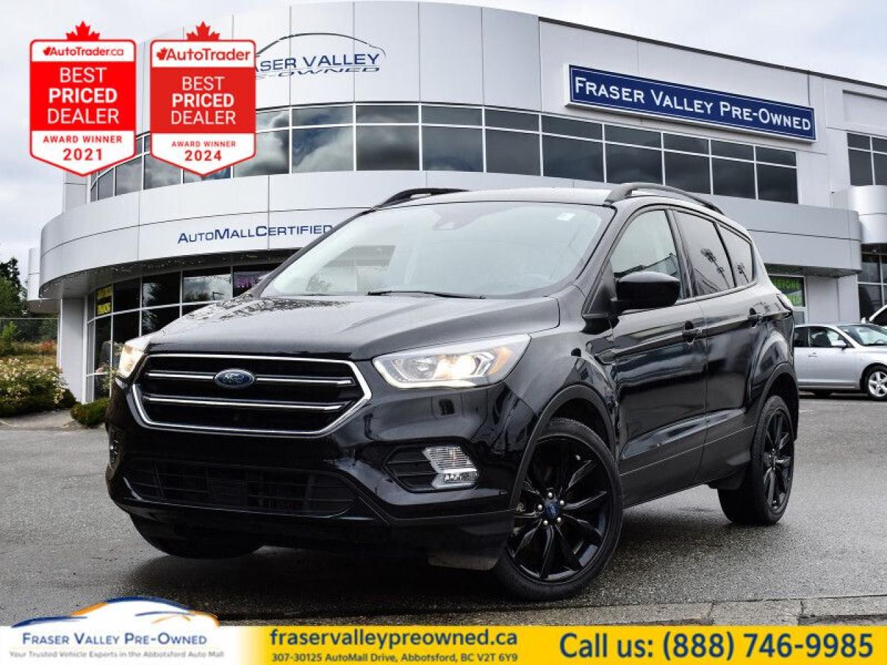 Low Mileage, Bluetooth,  Heated Seats,  Rear View Camera,  SiriusXM,  Aluminum Wheels!
 
    With athletic looks and a quiet, stylish interior, this Ford Escape distinguishes itself in a crowd of small crossovers. This  2018 Ford Escape is fresh on our lot in Abbotsford. 
 
Although there are many compact SUVs to choose from, few have the styling, performance, and features offered by this 5-passenger Ford Escape. Beyond its strong, efficient drivetrain and handsome styling, this Escape offers nimble handling and a comfortable ride. The interior boasts smart design and impressive features. If you need the versatility of an SUV but want something fuel-efficient and easy to drive, this Ford Escape is just right. This low mileage  SUV has just 57,500 kms. Its  nice in colour  . It has a 6 speed automatic transmission and is powered by a  179HP 1.5L 4 Cylinder Engine.  It may have some remaining factory warranty, please check with dealer for details. 
 
 Our Escapes trim level is SE. This Escape SE offers a satisfying blend of features and value. It comes with a SYNC infotainment system with Bluetooth connectivity, SiriusXM, a USB port, a rearview camera, heated front seats, steering wheel-mounted audio and cruise control, dual-zone automatic climate control, power windows, power doors, aluminum wheels, fog lamps, and more. This vehicle has been upgraded with the following features: Bluetooth,  Heated Seats,  Rear View Camera,  Siriusxm,  Aluminum Wheels,  Steering Wheel Audio Control. 
 To view the original window sticker for this vehicle view this http://www.windowsticker.forddirect.com/windowsticker.pdf?vin=1FMCU9GD9JUD10698. 

 
To apply right now for financing use this link : https://www.fraservalleypreowned.ca/abbotsford-car-loan-application-british-columbia
 
 

| Our Quality Guarantee: We maintain the highest standard of quality that is required for a Pre-Owned Dealership to operate in an Auto Mall. We provide an independent 360-degree inspection report through licensed 3rd Party mechanic shops. Thus, our customers can rest assured each vehicle will be a reliable, and responsible purchase.  |  Purchase Disclaimer: Your selected vehicle may have a differing finance and cash prices. When viewing our vehicles on third party  marketplaces, please click over to our website to verify the correct price for the vehicle. The Sale Price on third party websites will always reflect the Finance Price of our vehicles. If you are making a Cash Purchase, please refer to our website for the Cash Price of the vehicle.  | All prices are subject to and do not include, a $995 Finance Fee, and a $995 Document Fee.   These fees as well as taxes, are included in all listed listed payment quotes. Please speak with Dealer for full details and exact numbers.  o~o