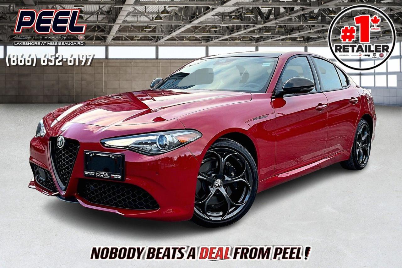 COME SEE WHY NOBODY BEATS A DEAL FROM PEEL! Your Source for ALL make and models used cars and trucks. Canadas #1 Stellantis Retailer for 8 years & counting!!

2023 Alfa Romeo Giulia Estrema AWD | 2.0L 280hp Turbocharged I-4 | Alfa Rosso Red | LOADED | Heated Sport Bucket Seats | Full Carbon Fibre Trim | Active Assist Plus Package | 14-speaker Harman/Kardon High Performance Audio System | Dual-pane Panoramic Sunroof | Adaptive Cruise Control | Lane Keep Assist | Forward Collision Warning | Blind Spot Monitoring | Traffic Sign Recognition | Apple CarPlay & Android Auto | Wireless Smartphone Charging Pad | Heated Rear Seats | Remote Start

One Owner Clean Carfax

Command attention with the bold styling and unparalleled performance of this 2023 Alfa Romeo Giulia Estrema AWD, a true masterpiece of Italian engineering. Finished in the stunning Alfa Rosso Red, this sport sedan pairs a 280hp 2.0L turbocharged I-4 engine with Alfa Romeos sophisticated AWD system, offering razor-sharp handling and exhilarating acceleration for driving enthusiasts. Inside, the luxurious cabin is adorned with full carbon fibre trim, heated sport bucket seats, and a dual-pane panoramic sunroof, blending performance-driven design with modern elegance.

This Giulia is loaded with features that cater to both convenience and safety, making every drive a pleasure. The Active Assist Plus Package includes adaptive cruise control, lane keep assist, forward collision warning, and blind spot monitoring, ensuring peace of mind on every journey. The 14-speaker Harman/Kardon audio system and wireless smartphone charging pad enhance connectivity and entertainment, while heated rear seats and remote start add comfort for passengers. With its sleek design, cutting-edge technology, and impeccable craftsmanship, this one-owner Giulia Estrema offers a driving experience thats both thrilling and refined. A clean Carfax adds to its appeal, making this a rare opportunity to own a luxury sedan that truly stands out.
______________________________________________________

Engage & Explore with Peel Chrysler: Whether youre inquiring about our latest offers or seeking guidance, 1-866-652-6197 connects you directly. Dive deeper online or connect with our team to navigate your automotive journey seamlessly.

WE TAKE ALL TRADES & CREDIT. WE SHIP ANYWHERE IN CANADA! OUR TEAM IS READY TO SERVE YOU 7 DAYS!
______________________________________________________
Our advertised prices are for consumers (i.e end users) only. 

*FREE CarFax (click the link above to check it out at no cost to you!)*

*FULLY CERTIFIED! (Have you seen some of these other dealers stating in their advertisements that certification is an additional fee? NOT HERE! Our certification is already included in our low sale prices to save you more!)

______________________________________________________

Peel Chrysler  A Trusted Destination: Based in Port Credit, Ontario, we proudly serve customers from all corners of Ontario and Canada including Toronto, Oakville, North York, Richmond Hill, Ajax, Hamilton, Niagara Falls, Brampton, Thornhill, Scarborough, Vaughan, London, Windsor, Cambridge, Kitchener, Waterloo, Brantford, Sarnia, Pickering, Huntsville, Milton, Woodbridge, Maple, Aurora, Newmarket, Orangeville, Georgetown, Stouffville, Markham, North Bay, Sudbury, Barrie, Sault Ste. Marie, Parry Sound, Bracebridge, Gravenhurst, Oshawa, Ajax, Kingston, Innisfil and surrounding areas. On our website www.peelchrysler.com, you will find a vast selection of new vehicles including the new and used Ram 1500, 2500 and 3500. Chrysler Grand Caravan, Chrysler Pacifica, Jeep Cherokee, Wrangler and more. All vehicles are priced to sell. We deliver throughout Canada. website or call us 1-866-652-6197. 

Your Journey, Our Commitment: Beyond the transaction, Peel Chrysler prioritizes your satisfaction. While many of our pre-owned vehicles come equipped with two keys, variations might occur based on trade-ins. Regardless, our commitment to quality and service remains steadfast. Experience unmatched convenience with our nationwide delivery options. All advertised prices are for cash sale only. Optional Finance and Lease terms are available. A Loan Processing Fee of $499 may apply to facilitate selected Finance or Lease options. If opting to trade an encumbered vehicle towards a purchase and require Peel Chrysler to facilitate a lien payout on your behalf, a Lien Payout Fee of $299 may apply. Contact us for details. Peel Chrysler Pre-Owned Vehicles come standard with only one key.