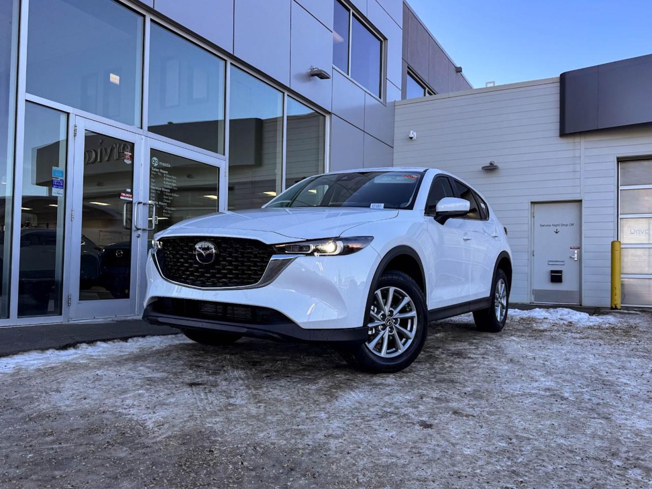 Our brilliant 2025 Mazda CX-5 GS takes center stage in Rhodium White Metallic! Its powered by a 2.5 Liter 4 Cylinder engine that produces 187 horsepower while paired to a 6-Speed automatic transmission with G-Vectoring Control. Youll leave other All-Wheel Drive SUVs in your dust while enjoying excellent handling with precise steering, all while scoring near 7.6L/100km on the highway. Its absolutely stunning with NEW alloy wheels, LED headlights/taillights and, a rear roof spoiler! The GS welcomes you with supportive leatherette seats that have lux suede inserts, heated front seats, a leather-wrapped heated steering wheel with mounted audio/cruise controls, a massive Mazda Connect infotainment system, a multi-function commander control, AM/FM/HD audio, and Bluetooth. This remarkably-styled CX-5 was made with you in mind!Youll drive our Mazda confidently knowing about its collection of safety features includingadvanced airbags, a tire pressure monitoring system, Smart City brake support, a backup camera, stability/traction control and more! Print this page and call us Now... We Know You Will Enjoy Your Test Drive Towards Ownership! We look forward to showing you why Go Mazda is the best place for all your automotive needs.Go Mazda is an AMVIC licensed business.Please note that a new administration fee from Mazda Canada of $595 will apply to finance and cash purchases effective February 1, 2024.