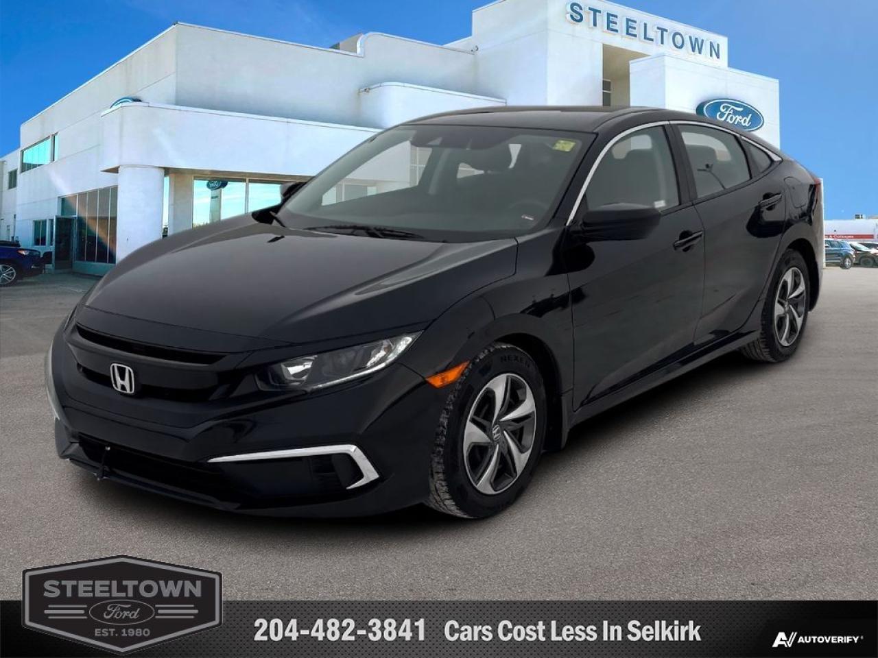 <b>Heated Seats,  Apple CarPlay,  Android Auto,  Lane Keep Assist,  Collision Mitigation!</b><br> <br> We value your TIME, we wont waste it or your gas is on us!   We offer extended test drives and if you cant make it out to us we will come straight to you!<br><br><br> <br>   The sporty design is perfectly complemented by its powerful, yet efficient engine, while its striking interior is designed with both comfort and safety in mind. This  2021 Honda Civic Sedan is for sale today in Selkirk. <br> <br>With harmonious power, excellent handling capability, plus its engaging driving dynamic, this 2021 Honda Civic is a highly compelling choice in the eco-friendly compact car segment. Regardless of your style preference or driving habits, this impressive Honda Civic will perfectly suit your wants and needs. The Civic offers the right amount of cargo space, an aggressive exterior design with sporty and sleek body lines, plus a comfortable and ergonomic interior layout that works well with all family sizes. This Civic easily makes a bold statement without saying a word! This  sedan has 90,216 kms. Its  white in colour  . It has an automatic transmission and is powered by a  158HP 2.0L 4 Cylinder Engine.  It may have some remaining factory warranty, please check with dealer for details. <br> <br> Our Civic Sedans trim level is LX. This base model LX Civic still packs a lot of features for an incredible value with driver assistance technology like collision mitigation with forward collision warning, lane keep assist with road departure mitigation, adaptive cruise control, straight driving assist for slopes, and automatic highbeams you normally only expect with a higher price. The interior is as comfy and advanced as you need with heated front seats, remote keyless entry, Apple CarPlay, Android Auto, Bluetooth, Siri EyesFree, WiFi tethering, steering wheel with cruise and audio controls, multi-angle rearview camera, 7 inch driver information display, and automatic climate control. The exterior has some great style with aluminum wheels, independent suspension, heated power side mirrors, and LED taillamps. This vehicle has been upgraded with the following features: Heated Seats,  Apple Carplay,  Android Auto,  Lane Keep Assist,  Collision Mitigation,  Siri Eyesfree,  Remote Keyless Entry. <br> <br>To apply right now for financing use this link : <a href=http://www.steeltownford.com/?https://CreditOnline.dealertrack.ca/Web/Default.aspx?Token=bf62ebad-31a4-49e3-93be-9b163c26b54c&La target=_blank>http://www.steeltownford.com/?https://CreditOnline.dealertrack.ca/Web/Default.aspx?Token=bf62ebad-31a4-49e3-93be-9b163c26b54c&La</a><br><br> <br/><br> Buy this vehicle now for the lowest bi-weekly payment of <b>$168.74</b> with $0 down for 96 months @ 8.99% APR O.A.C. ( Plus applicable taxes -  Platinum Shield Protection & Tire Warranty included   / Total cost of borrowing $10099   ).  See dealer for details. <br> <br>Family owned and operated in Selkirk for 35 Years.  <br>Steeltown Ford is located just 20 minutes North of the Perimeter Hwy, with an onsite banking center that offers free consultations. <br>Ask about our special dealer rates available through all major banks and credit unions.<br><br><br>Steeltown Ford Protect Plus includes:<br>- Life Time Tire Warranty <br>Cars cost less in Selkirk <br><br>Dealer Permit # 1039<br><br><br> Come by and check out our fleet of 100+ used cars and trucks and 140+ new cars and trucks for sale in Selkirk.  o~o