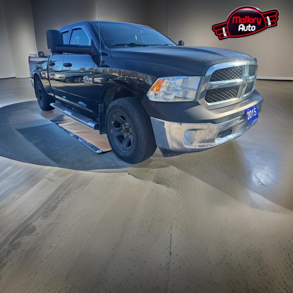 Used 2015 RAM 1500 4WD QUAD CAB 140.5