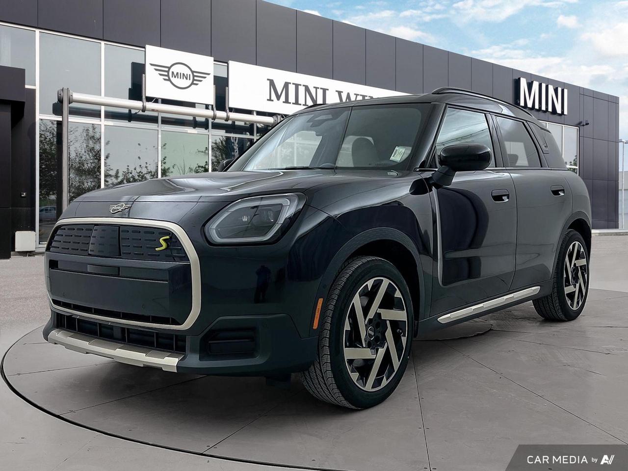 Experience the future of driving with the 2025 MINI Countryman SE, a cutting-edge electric SUV that combines style, performance, and sustainability. This all-new model redefines urban mobility with its sleek Midnight Black II exterior and luxurious Beige interior.

Key Features:
- All-Wheel Drive for superior handling and traction
- MINI Head-Up Display for enhanced driving focus
- Voice Activated Dual Zone Front Automatic Air Conditioning
- Collision Mitigation systems for front and rear
- Driving Assistant Blind Spot for increased safety
- 40-20-40 Folding Split-Bench Rear Seat for versatile cargo options
- Electric Power-Assist Speed-Sensing Steering for precise control

Ready to embrace the electric revolution? Reserve your 2025 MINI Countryman SE today at MINI Winnipeg. Visit our website at www.birchwoodbmw.ca to start your purchase journey or book a test drive. Our team is eager to answer any questions you may have about this remarkable vehicle. Dont miss your chance to own the future of MINI!
At MINI Winnipeg, we constantly strive to provide the best service and experience for every customer. 

	Enjoy No-Charge Scheduled Maintenance for 3yr/40k.
	MINI Factory Certified Technicians and Authentic MINI Parts.
	26 Loaner Vehicles & Valet Service

Get ready to Motor On! Call to book your appointment at 204-897-6464. Dealer Permit# 9740
Dealer permit #9740