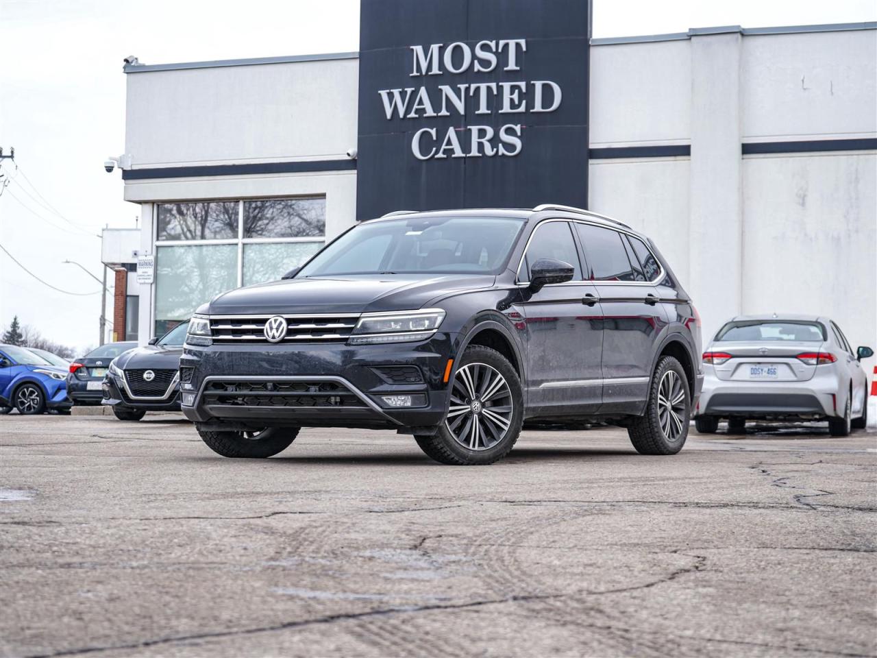 <div style=text-align: justify;><span style=font-size:14px;><span style=font-family:times new roman,times,serif;>This 2018 Volkswagen Tiguan has a CLEAN CARFAX with no accidents and is also a Canadian vehicle with service records. High-value options included with this vehicle are; blind spot indicators, lane departure warning, adaptive cruise control, pre-collision warning, navigation,  fender audio, panoramic sunroof, brown leather / heated / power / memory seats, heated steering wheel, convenience entry, push button, power tailgate, app connect, back up camera, touchscreen and 18” alloy rims, offering immense value.</span></span><br /><br /><span style=font-size:14px;><span style=font-family:times new roman,times,serif;>Why buy from us?<br /> <br />Most Wanted Cars is a place where customers send their family and friends. MWC offers the best financing options in Kitchener-Waterloo and the surrounding areas. Family-owned and operated, MWC has served customers since 1975 and is also DealerRater’s 2022 Provincial Winner for Used Car Dealers. MWC is also honoured to have an A+ standing on Better Business Bureau and a 4.8/5 customer satisfaction rating across all online platforms with over 1400 reviews. With two locations to serve you better, our inventory consists of over 150 used cars, trucks, vans, and SUVs.<br /> <br />Our main office is located at 1620 King Street East, Kitchener, Ontario. Please call us at 519-772-3040 or visit our website at www.mostwantedcars.ca to check out our full inventory list and complete an easy online finance application to get exclusive online preferred rates.<br /> <br />*Price listed is available to finance purchases only on approved credit. The price of the vehicle may differ from other forms of payment. Taxes and licensing are excluded from the price shown above*</span></span></div><br />