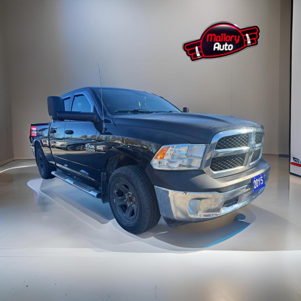 Used 2015 RAM 1500 4WD QUAD CAB 140.5