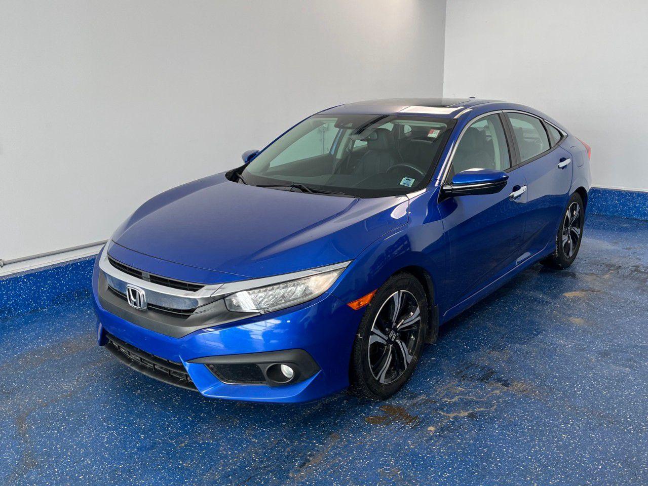 New Price! 2017 Honda Civic Touring Touring | Zacks Certified. CVT FWD Aegean Blue Metallic 1.5L I4 DOHC 16V<br /><br /><br />New Tires, New Brakes, Dealer Maintained, Black w/Leather Seat Trim, 17''' Aluminum Alloy Wheels, Apple CarPlay/Android Auto, Automatic temperature control, Exterior Parking Camera Rear, Front fog lights, Heated Front Bucket Seats, Lane departure: Lane Keeping Assist System (LKAS) active, Leather Shift Knob, Leather-Trimmed Seating Surfaces, Navigation System, Power driver seat, Power moonroof, Power steering, Power windows, Radio: 452-Watt AM/FM/HD/SiriusXM Premium Audio, Remote keyless entry.<br /><br />Certification Program Details: Fully Reconditioned | Fresh 2 Yr MVI | 30 day warranty* | 110 point inspection | Full tank of fuel | Krown rustproofed | Flexible financing options | Professionally detailed<br /><br />This vehicle is Zacks Certified! You're approved! We work with you. Together we'll find a solution that makes sense for your individual situation. Please visit us or call 902 843-3900 to learn about our great selection.<br />Awards:<br />  * IIHS Canada Top Safety Pick Reviews:<br />  * This generation of Civic attracted shoppers with Hondas reputation for safety and reliability, and many owners report that good looks, a thoughtful and handy interior, and plenty of feature content for the money helped seal the deal. Headlight performance is highly rated, as is a smooth and punchy performance from the turbocharged engine. Source: autoTRADER.ca<br /><br />With 22 lenders available Zack's Auto Sales can offer our customers with the lowest available interest rate. Thank you for taking the time to check out our selection!