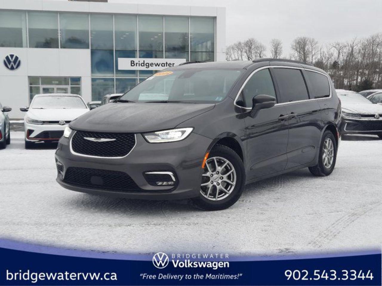 New Price! Granite Crystal Metallic Clearcoat 2022 Chrysler Pacifica Touring Incoming Unit! RESERVE it today! FWD 9-Speed Automatic Pentastar 3.6L V6 VVT Bridgewater Volkswagen, Located in Bridgewater Nova Scotia.3.25 Axle Ratio, 3rd row seats: split-bench, 4-Wheel Disc Brakes, 6 Speakers, ABS brakes, Air Conditioning, Alloy wheels, AM/FM radio: SiriusXM, Apple CarPlay/Android Auto, Auto High-beam Headlights, Auto-dimming Rear-View mirror, Automatic temperature control, Black Seats, Brake assist, Bumpers: body-colour, Cloth Bucket Seats w/Ravine Inserts, Compass, Delay-off headlights, Door auto-latch, Driver door bin, Driver vanity mirror, Drivers Seat Mounted Armrest, Dual front impact airbags, Dual front side impact airbags, Electronic Stability Control, Four wheel independent suspension, Front anti-roll bar, Front Bucket Seats, Front dual zone A/C, Front Fascia Air Deflectors, Front fog lights, Front reading lights, Fully automatic headlights, Garage door transmitter: HomeLink, Heated door mirrors, Heated front seats, Heated steering wheel, Illuminated entry, Knee airbag, Low tire pressure warning, Occupant sensing airbag, Outside temperature display, Overhead airbag, Overhead console, Panic alarm, ParkSense Rear Park Assist Unavailable, ParkView Rear Back-Up Camera, Passenger door bin, Passenger seat mounted armrest, Passenger vanity mirror, Power door mirrors, Power driver seat, Power Liftgate, Power steering, Power windows, Quick Order Package 27W, Radio data system, Radio: Uconnect 5 w/10.1 Display, Rain sensing wipers, Rear air conditioning, Rear reading lights, Rear window defroster, Rear window wiper, Reclining 3rd row seat, Remote keyless entry, Roof rack, Security system, Speed control, Split folding rear seat, Spoiler, Steering wheel mounted audio controls, Tachometer, Telescoping steering wheel, Tilt steering wheel, Touring Suspension, Traction control, Trip computer, Turn signal indicator mirrors, Variably intermittent wipers, Voltmeter, Wheels: 17 x 7.0 Fully Painted Aluminum.Certification Program Details: 150 Points Inspection Fresh Oil Change Free Carfax Full Detail 2 years MVI Full Tank of Gas The 150+ point inspection includes: Engine Instrumentation Interior components Pre-test drive inspections The test drive Service bay inspection Appearance Final inspection