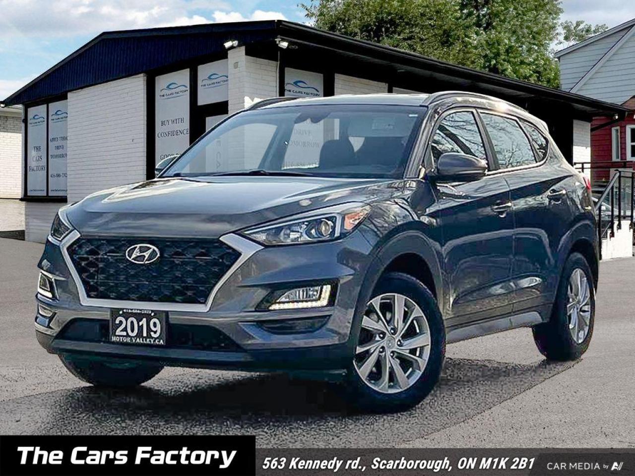 <p>🚗 <strong>For Sale: 2019 Hyundai Tucson Preferred AWD with Trend Package</strong> 🚗</p><p>🌟 <strong>One Owner | Exceptional Condition Inside & Out!</strong> 🌟</p><p>Looking for a reliable, stylish, and well-equipped vehicle? This <strong>2019 Hyundai Tucson Preferred AWD</strong> with the <strong>Trend Package</strong> is the perfect blend of performance, comfort, and technology!</p><p>🔑 <strong>Key Features:</strong></p><ul><li><strong>All-Wheel Drive (AWD)</strong> – Perfect for all seasons and terrains!</li><li><strong>Heated Seats & Steering Wheel</strong> – Stay cozy during cold weather.</li><li><strong>Backup Camera</strong> – Parking and reversing made easy!</li><li><strong>Blindspot Monitor & Lane Assist</strong> – Drive with confidence and safety.</li><li><strong>Apple CarPlay & Android Auto</strong> – Seamless smartphone integration for your entertainment and navigation.</li><li><strong>Much More!</strong> – Additional premium features for your convenience and comfort.</li></ul><p>✅ <strong>Why Choose This Tucson?</strong></p><ul><li><strong>One-Owner</strong>: Meticulously maintained and exceptionally clean.</li><li><strong>Stylish & Practical</strong>: Perfect for daily commutes, road trips, and everything in between.</li></ul><p> </p><p style=border: 0px solid #e5e7eb; box-sizing: border-box; --tw-border-spacing-x: 0; --tw-border-spacing-y: 0; --tw-translate-x: 0; --tw-translate-y: 0; --tw-rotate: 0; --tw-skew-x: 0; --tw-skew-y: 0; --tw-scale-x: 1; --tw-scale-y: 1; --tw-scroll-snap-strictness: proximity; --tw-ring-offset-width: 0px; --tw-ring-offset-color: #fff; --tw-ring-color: rgba(59,130,246,.5); --tw-ring-offset-shadow: 0 0 #0000; --tw-ring-shadow: 0 0 #0000; --tw-shadow: 0 0 #0000; --tw-shadow-colored: 0 0 #0000; margin: 0px; font-family: Roboto; font-size: 14px; background-color: #ffffff;><span style=border: 0px solid #e5e7eb; box-sizing: border-box; --tw-border-spacing-x: 0; --tw-border-spacing-y: 0; --tw-translate-x: 0; --tw-translate-y: 0; --tw-rotate: 0; --tw-skew-x: 0; --tw-skew-y: 0; --tw-scale-x: 1; --tw-scale-y: 1; --tw-scroll-snap-strictness: proximity; --tw-ring-offset-width: 0px; --tw-ring-offset-color: #fff; --tw-ring-color: rgba(59,130,246,.5); --tw-ring-offset-shadow: 0 0 #0000; --tw-ring-shadow: 0 0 #0000; --tw-shadow: 0 0 #0000; --tw-shadow-colored: 0 0 #0000; font-weight: bolder;>Welcome to The Cars Factory!</span></p><p style=border: 0px solid #e5e7eb; box-sizing: border-box; --tw-border-spacing-x: 0; --tw-border-spacing-y: 0; --tw-translate-x: 0; --tw-translate-y: 0; --tw-rotate: 0; --tw-skew-x: 0; --tw-skew-y: 0; --tw-scale-x: 1; --tw-scale-y: 1; --tw-scroll-snap-strictness: proximity; --tw-ring-offset-width: 0px; --tw-ring-offset-color: #fff; --tw-ring-color: rgba(59,130,246,.5); --tw-ring-offset-shadow: 0 0 #0000; --tw-ring-shadow: 0 0 #0000; --tw-shadow: 0 0 #0000; --tw-shadow-colored: 0 0 #0000; margin: 0px; font-family: Roboto; font-size: 14px; background-color: #ffffff;>We operate by appointment and are located at: <span style=border: 0px solid #e5e7eb; box-sizing: border-box; --tw-border-spacing-x: 0; --tw-border-spacing-y: 0; --tw-translate-x: 0; --tw-translate-y: 0; --tw-rotate: 0; --tw-skew-x: 0; --tw-skew-y: 0; --tw-scale-x: 1; --tw-scale-y: 1; --tw-scroll-snap-strictness: proximity; --tw-ring-offset-width: 0px; --tw-ring-offset-color: #fff; --tw-ring-color: rgba(59,130,246,.5); --tw-ring-offset-shadow: 0 0 #0000; --tw-ring-shadow: 0 0 #0000; --tw-shadow: 0 0 #0000; --tw-shadow-colored: 0 0 #0000; font-weight: bolder;>563 Kennedy Rd., Scarborough, Ontario, Canada.</span></p><hr style=border-right-style: initial; border-bottom-style: initial; border-left-style: initial; border-color: #e5e7eb; border-image: initial; box-sizing: content-box; --tw-border-spacing-x: 0; --tw-border-spacing-y: 0; --tw-translate-x: 0; --tw-translate-y: 0; --tw-rotate: 0; --tw-skew-x: 0; --tw-skew-y: 0; --tw-scale-x: 1; --tw-scale-y: 1; --tw-scroll-snap-strictness: proximity; --tw-ring-offset-width: 0px; --tw-ring-offset-color: #fff; --tw-ring-color: rgba(59,130,246,.5); --tw-ring-offset-shadow: 0 0 #0000; --tw-ring-shadow: 0 0 #0000; --tw-shadow: 0 0 #0000; --tw-shadow-colored: 0 0 #0000; height: 0px; margin: 1rem 0px; overflow: visible; font-family: Roboto; font-size: 14px; background-color: #ffffff; /><p style=border: 0px solid #e5e7eb; box-sizing: border-box; --tw-border-spacing-x: 0; --tw-border-spacing-y: 0; --tw-translate-x: 0; --tw-translate-y: 0; --tw-rotate: 0; --tw-skew-x: 0; --tw-skew-y: 0; --tw-scale-x: 1; --tw-scale-y: 1; --tw-scroll-snap-strictness: proximity; --tw-ring-offset-width: 0px; --tw-ring-offset-color: #fff; --tw-ring-color: rgba(59,130,246,.5); --tw-ring-offset-shadow: 0 0 #0000; --tw-ring-shadow: 0 0 #0000; --tw-shadow: 0 0 #0000; --tw-shadow-colored: 0 0 #0000; margin: 0px; font-family: Roboto; font-size: 14px; background-color: #ffffff;><span style=border: 0px solid #e5e7eb; box-sizing: border-box; --tw-border-spacing-x: 0; --tw-border-spacing-y: 0; --tw-translate-x: 0; --tw-translate-y: 0; --tw-rotate: 0; --tw-skew-x: 0; --tw-skew-y: 0; --tw-scale-x: 1; --tw-scale-y: 1; --tw-scroll-snap-strictness: proximity; --tw-ring-offset-width: 0px; --tw-ring-offset-color: #fff; --tw-ring-color: rgba(59,130,246,.5); --tw-ring-offset-shadow: 0 0 #0000; --tw-ring-shadow: 0 0 #0000; --tw-shadow: 0 0 #0000; --tw-shadow-colored: 0 0 #0000; font-weight: bolder;>CERTIFICATION</span></p><p style=border: 0px solid #e5e7eb; box-sizing: border-box; --tw-border-spacing-x: 0; --tw-border-spacing-y: 0; --tw-translate-x: 0; --tw-translate-y: 0; --tw-rotate: 0; --tw-skew-x: 0; --tw-skew-y: 0; --tw-scale-x: 1; --tw-scale-y: 1; --tw-scroll-snap-strictness: proximity; --tw-ring-offset-width: 0px; --tw-ring-offset-color: #fff; --tw-ring-color: rgba(59,130,246,.5); --tw-ring-offset-shadow: 0 0 #0000; --tw-ring-shadow: 0 0 #0000; --tw-shadow: 0 0 #0000; --tw-shadow-colored: 0 0 #0000; margin: 0px; font-family: Roboto; font-size: 14px; background-color: #ffffff;>Have your new pre-owned vehicle certified by The Cars Factory! We offer a full safety inspection exceeding industry standards, including an oil change and professional detailing prior to delivery. Vehicles are not drivable if not certified and not e-tested. A certification package is available for $899. All trade-ins are welcome. Taxes and licensing are extra.</p><hr style=border-right-style: initial; border-bottom-style: initial; border-left-style: initial; border-color: #e5e7eb; border-image: initial; box-sizing: content-box; --tw-border-spacing-x: 0; --tw-border-spacing-y: 0; --tw-translate-x: 0; --tw-translate-y: 0; --tw-rotate: 0; --tw-skew-x: 0; --tw-skew-y: 0; --tw-scale-x: 1; --tw-scale-y: 1; --tw-scroll-snap-strictness: proximity; --tw-ring-offset-width: 0px; --tw-ring-offset-color: #fff; --tw-ring-color: rgba(59,130,246,.5); --tw-ring-offset-shadow: 0 0 #0000; --tw-ring-shadow: 0 0 #0000; --tw-shadow: 0 0 #0000; --tw-shadow-colored: 0 0 #0000; height: 0px; margin: 1rem 0px; overflow: visible; font-family: Roboto; font-size: 14px; background-color: #ffffff; /><p style=border: 0px solid #e5e7eb; box-sizing: border-box; --tw-border-spacing-x: 0; --tw-border-spacing-y: 0; --tw-translate-x: 0; --tw-translate-y: 0; --tw-rotate: 0; --tw-skew-x: 0; --tw-skew-y: 0; --tw-scale-x: 1; --tw-scale-y: 1; --tw-scroll-snap-strictness: proximity; --tw-ring-offset-width: 0px; --tw-ring-offset-color: #fff; --tw-ring-color: rgba(59,130,246,.5); --tw-ring-offset-shadow: 0 0 #0000; --tw-ring-shadow: 0 0 #0000; --tw-shadow: 0 0 #0000; --tw-shadow-colored: 0 0 #0000; margin: 0px; font-family: Roboto; font-size: 14px; background-color: #ffffff;><span style=border: 0px solid #e5e7eb; box-sizing: border-box; --tw-border-spacing-x: 0; --tw-border-spacing-y: 0; --tw-translate-x: 0; --tw-translate-y: 0; --tw-rotate: 0; --tw-skew-x: 0; --tw-skew-y: 0; --tw-scale-x: 1; --tw-scale-y: 1; --tw-scroll-snap-strictness: proximity; --tw-ring-offset-width: 0px; --tw-ring-offset-color: #fff; --tw-ring-color: rgba(59,130,246,.5); --tw-ring-offset-shadow: 0 0 #0000; --tw-ring-shadow: 0 0 #0000; --tw-shadow: 0 0 #0000; --tw-shadow-colored: 0 0 #0000; font-weight: bolder;>FINANCING</span></p><p style=border: 0px solid #e5e7eb; box-sizing: border-box; --tw-border-spacing-x: 0; --tw-border-spacing-y: 0; --tw-translate-x: 0; --tw-translate-y: 0; --tw-rotate: 0; --tw-skew-x: 0; --tw-skew-y: 0; --tw-scale-x: 1; --tw-scale-y: 1; --tw-scroll-snap-strictness: proximity; --tw-ring-offset-width: 0px; --tw-ring-offset-color: #fff; --tw-ring-color: rgba(59,130,246,.5); --tw-ring-offset-shadow: 0 0 #0000; --tw-ring-shadow: 0 0 #0000; --tw-shadow: 0 0 #0000; --tw-shadow-colored: 0 0 #0000; margin: 0px; font-family: Roboto; font-size: 14px; background-color: #ffffff;>Experience hassle-free financing tailored to your needs. Whether you have no credit, are new to the country, or have a history of bankruptcy, consumer proposal, or collections, our finance and credit experts specialize in securing approvals. Bad credit is often sufficient. Seize the opportunity to get approved and start rebuilding your credit today. Please note that financing deals are subject to an administrative fee. Benefit from on-the-spot financing and enjoy instant approvals for a seamless process.</p><hr style=border-right-style: initial; border-bottom-style: initial; border-left-style: initial; border-color: #e5e7eb; border-image: initial; box-sizing: content-box; --tw-border-spacing-x: 0; --tw-border-spacing-y: 0; --tw-translate-x: 0; --tw-translate-y: 0; --tw-rotate: 0; --tw-skew-x: 0; --tw-skew-y: 0; --tw-scale-x: 1; --tw-scale-y: 1; --tw-scroll-snap-strictness: proximity; --tw-ring-offset-width: 0px; --tw-ring-offset-color: #fff; --tw-ring-color: rgba(59,130,246,.5); --tw-ring-offset-shadow: 0 0 #0000; --tw-ring-shadow: 0 0 #0000; --tw-shadow: 0 0 #0000; --tw-shadow-colored: 0 0 #0000; height: 0px; margin: 1rem 0px; overflow: visible; font-family: Roboto; font-size: 14px; background-color: #ffffff; /><p style=border: 0px solid #e5e7eb; box-sizing: border-box; --tw-border-spacing-x: 0; --tw-border-spacing-y: 0; --tw-translate-x: 0; --tw-translate-y: 0; --tw-rotate: 0; --tw-skew-x: 0; --tw-skew-y: 0; --tw-scale-x: 1; --tw-scale-y: 1; --tw-scroll-snap-strictness: proximity; --tw-ring-offset-width: 0px; --tw-ring-offset-color: #fff; --tw-ring-color: rgba(59,130,246,.5); --tw-ring-offset-shadow: 0 0 #0000; --tw-ring-shadow: 0 0 #0000; --tw-shadow: 0 0 #0000; --tw-shadow-colored: 0 0 #0000; margin: 0px; font-family: Roboto; font-size: 14px; background-color: #ffffff;><span style=border: 0px solid #e5e7eb; box-sizing: border-box; --tw-border-spacing-x: 0; --tw-border-spacing-y: 0; --tw-translate-x: 0; --tw-translate-y: 0; --tw-rotate: 0; --tw-skew-x: 0; --tw-skew-y: 0; --tw-scale-x: 1; --tw-scale-y: 1; --tw-scroll-snap-strictness: proximity; --tw-ring-offset-width: 0px; --tw-ring-offset-color: #fff; --tw-ring-color: rgba(59,130,246,.5); --tw-ring-offset-shadow: 0 0 #0000; --tw-ring-shadow: 0 0 #0000; --tw-shadow: 0 0 #0000; --tw-shadow-colored: 0 0 #0000; font-weight: bolder;>WARRANTY</span></p><p style=border: 0px solid #e5e7eb; box-sizing: border-box; --tw-border-spacing-x: 0; --tw-border-spacing-y: 0; --tw-translate-x: 0; --tw-translate-y: 0; --tw-rotate: 0; --tw-skew-x: 0; --tw-skew-y: 0; --tw-scale-x: 1; --tw-scale-y: 1; --tw-scroll-snap-strictness: proximity; --tw-ring-offset-width: 0px; --tw-ring-offset-color: #fff; --tw-ring-color: rgba(59,130,246,.5); --tw-ring-offset-shadow: 0 0 #0000; --tw-ring-shadow: 0 0 #0000; --tw-shadow: 0 0 #0000; --tw-shadow-colored: 0 0 #0000; margin: 0px; font-family: Roboto; font-size: 14px; background-color: #ffffff;>Extend your peace of mind with an eligible extended warranty for this vehicle. Explore customizable coverage options for added assurance. Consult with our team to select the ideal plan for your needs.</p><hr style=border-right-style: initial; border-bottom-style: initial; border-left-style: initial; border-color: #e5e7eb; border-image: initial; box-sizing: content-box; --tw-border-spacing-x: 0; --tw-border-spacing-y: 0; --tw-translate-x: 0; --tw-translate-y: 0; --tw-rotate: 0; --tw-skew-x: 0; --tw-skew-y: 0; --tw-scale-x: 1; --tw-scale-y: 1; --tw-scroll-snap-strictness: proximity; --tw-ring-offset-width: 0px; --tw-ring-offset-color: #fff; --tw-ring-color: rgba(59,130,246,.5); --tw-ring-offset-shadow: 0 0 #0000; --tw-ring-shadow: 0 0 #0000; --tw-shadow: 0 0 #0000; --tw-shadow-colored: 0 0 #0000; height: 0px; margin: 1rem 0px; overflow: visible; font-family: Roboto; font-size: 14px; background-color: #ffffff; /><p style=border: 0px solid #e5e7eb; box-sizing: border-box; --tw-border-spacing-x: 0; --tw-border-spacing-y: 0; --tw-translate-x: 0; --tw-translate-y: 0; --tw-rotate: 0; --tw-skew-x: 0; --tw-skew-y: 0; --tw-scale-x: 1; --tw-scale-y: 1; --tw-scroll-snap-strictness: proximity; --tw-ring-offset-width: 0px; --tw-ring-offset-color: #fff; --tw-ring-color: rgba(59,130,246,.5); --tw-ring-offset-shadow: 0 0 #0000; --tw-ring-shadow: 0 0 #0000; --tw-shadow: 0 0 #0000; --tw-shadow-colored: 0 0 #0000; margin: 0px; font-family: Roboto; font-size: 14px; background-color: #ffffff;><span style=border: 0px solid #e5e7eb; box-sizing: border-box; --tw-border-spacing-x: 0; --tw-border-spacing-y: 0; --tw-translate-x: 0; --tw-translate-y: 0; --tw-rotate: 0; --tw-skew-x: 0; --tw-skew-y: 0; --tw-scale-x: 1; --tw-scale-y: 1; --tw-scroll-snap-strictness: proximity; --tw-ring-offset-width: 0px; --tw-ring-offset-color: #fff; --tw-ring-color: rgba(59,130,246,.5); --tw-ring-offset-shadow: 0 0 #0000; --tw-ring-shadow: 0 0 #0000; --tw-shadow: 0 0 #0000; --tw-shadow-colored: 0 0 #0000; font-weight: bolder;>PRICE</span></p><p style=border: 0px solid #e5e7eb; box-sizing: border-box; --tw-border-spacing-x: 0; --tw-border-spacing-y: 0; --tw-translate-x: 0; --tw-translate-y: 0; --tw-rotate: 0; --tw-skew-x: 0; --tw-skew-y: 0; --tw-scale-x: 1; --tw-scale-y: 1; --tw-scroll-snap-strictness: proximity; --tw-ring-offset-width: 0px; --tw-ring-offset-color: #fff; --tw-ring-color: rgba(59,130,246,.5); --tw-ring-offset-shadow: 0 0 #0000; --tw-ring-shadow: 0 0 #0000; --tw-shadow: 0 0 #0000; --tw-shadow-colored: 0 0 #0000; margin: 0px; font-family: Roboto; font-size: 14px; background-color: #ffffff;>At The Cars Factory, transparency is our policy. We offer no-haggle pricing, ensuring everyone receives the best price from the start. Constant market monitoring allows you to buy with confidence, knowing youre getting a great deal.</p><hr style=border-right-style: initial; border-bottom-style: initial; border-left-style: initial; border-color: #e5e7eb; border-image: initial; box-sizing: content-box; --tw-border-spacing-x: 0; --tw-border-spacing-y: 0; --tw-translate-x: 0; --tw-translate-y: 0; --tw-rotate: 0; --tw-skew-x: 0; --tw-skew-y: 0; --tw-scale-x: 1; --tw-scale-y: 1; --tw-scroll-snap-strictness: proximity; --tw-ring-offset-width: 0px; --tw-ring-offset-color: #fff; --tw-ring-color: rgba(59,130,246,.5); --tw-ring-offset-shadow: 0 0 #0000; --tw-ring-shadow: 0 0 #0000; --tw-shadow: 0 0 #0000; --tw-shadow-colored: 0 0 #0000; height: 0px; margin: 1rem 0px; overflow: visible; font-family: Roboto; font-size: 14px; background-color: #ffffff; /><p style=border: 0px solid #e5e7eb; box-sizing: border-box; --tw-border-spacing-x: 0; --tw-border-spacing-y: 0; --tw-translate-x: 0; --tw-translate-y: 0; --tw-rotate: 0; --tw-skew-x: 0; --tw-skew-y: 0; --tw-scale-x: 1; --tw-scale-y: 1; --tw-scroll-snap-strictness: proximity; --tw-ring-offset-width: 0px; --tw-ring-offset-color: #fff; --tw-ring-color: rgba(59,130,246,.5); --tw-ring-offset-shadow: 0 0 #0000; --tw-ring-shadow: 0 0 #0000; --tw-shadow: 0 0 #0000; --tw-shadow-colored: 0 0 #0000; margin: 0px; font-family: Roboto; font-size: 14px; background-color: #ffffff;><span style=border: 0px solid #e5e7eb; box-sizing: border-box; --tw-border-spacing-x: 0; --tw-border-spacing-y: 0; --tw-translate-x: 0; --tw-translate-y: 0; --tw-rotate: 0; --tw-skew-x: 0; --tw-skew-y: 0; --tw-scale-x: 1; --tw-scale-y: 1; --tw-scroll-snap-strictness: proximity; --tw-ring-offset-width: 0px; --tw-ring-offset-color: #fff; --tw-ring-color: rgba(59,130,246,.5); --tw-ring-offset-shadow: 0 0 #0000; --tw-ring-shadow: 0 0 #0000; --tw-shadow: 0 0 #0000; --tw-shadow-colored: 0 0 #0000; font-weight: bolder;>Discover The Cars Factory Difference</span></p><p style=border: 0px solid #e5e7eb; box-sizing: border-box; --tw-border-spacing-x: 0; --tw-border-spacing-y: 0; --tw-translate-x: 0; --tw-translate-y: 0; --tw-rotate: 0; --tw-skew-x: 0; --tw-skew-y: 0; --tw-scale-x: 1; --tw-scale-y: 1; --tw-scroll-snap-strictness: proximity; --tw-ring-offset-width: 0px; --tw-ring-offset-color: #fff; --tw-ring-color: rgba(59,130,246,.5); --tw-ring-offset-shadow: 0 0 #0000; --tw-ring-shadow: 0 0 #0000; --tw-shadow: 0 0 #0000; --tw-shadow-colored: 0 0 #0000; margin: 0px; font-family: Roboto; font-size: 14px; background-color: #ffffff;>Where quality, transparency, and customer satisfaction converge.</p><p style=border: 0px solid #e5e7eb; box-sizing: border-box; --tw-border-spacing-x: 0; --tw-border-spacing-y: 0; --tw-translate-x: 0; --tw-translate-y: 0; --tw-rotate: 0; --tw-skew-x: 0; --tw-skew-y: 0; --tw-scale-x: 1; --tw-scale-y: 1; --tw-scroll-snap-strictness: proximity; --tw-ring-offset-width: 0px; --tw-ring-offset-color: #fff; --tw-ring-color: rgba(59,130,246,.5); --tw-ring-offset-shadow: 0 0 #0000; --tw-ring-shadow: 0 0 #0000; --tw-shadow: 0 0 #0000; --tw-shadow-colored: 0 0 #0000; margin: 0px; font-family: Inter, sans-serif;> </p>