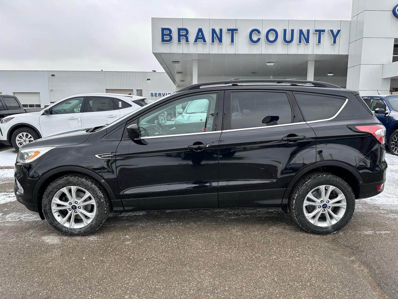 <p>2017 ESCAPE SE FWD, LEATHER SEATING , TWIN PANEL MOONROODF, NAVIGATION AND MORE. </p><p class=MsoNoSpacing>Price includes safety.  We are a full disclosure dealership - ask to see this vehicles CarFax report.</p><p class=MsoNoSpacing> Brant County Ford is a family-owned dealership and has been a proud member of the Brantford community for over 40 years!</p><p class=MsoNoSpacing>** See dealer for details.</p><p class=MsoNoSpacing>*Please note all prices are plus HST and Licensing.</p><p class=MsoNoSpacing>* Prices in Ontario, Alberta and British Columbia include OMVIC/AMVIC fee (where applicable), accessories, other dealer installed options, administration and other retailer charges.</p><p class=MsoNoSpacing> </p><p> </p><p class=MsoNoSpacing>All prices are in Canadian dollars (unless otherwise indicated). Retailers are free to set individual prices.</p><p> </p><p> </p>