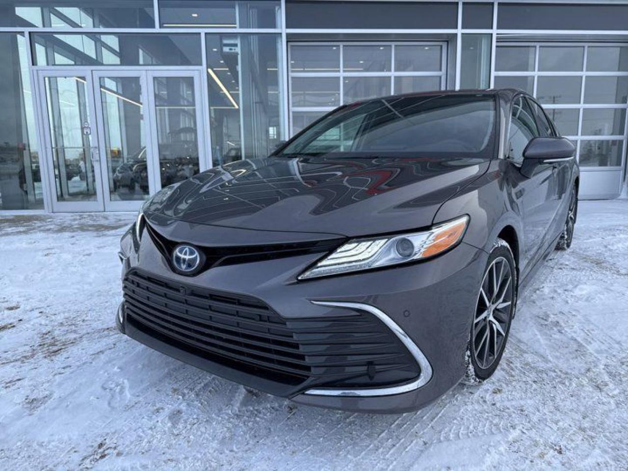 Check out this amazing 2023 Toyota Camry Hybrid XLE! This one owner, front wheel drive comes equipped with a back up camera, Bluetooth, Apple Car Play, Android Auto, navigation, connected services available, air cooled and heated power, leather seats, heated steering wheel, remote starter, alloy rims, and a sun roof!This Toyota Certified Camry Hybrid XLE offers 24/7 roadside service, a stringent 160 point inspection and a first fresh oil and filter change, and so much more to bring you peace of mind!Come in for your test drive today!