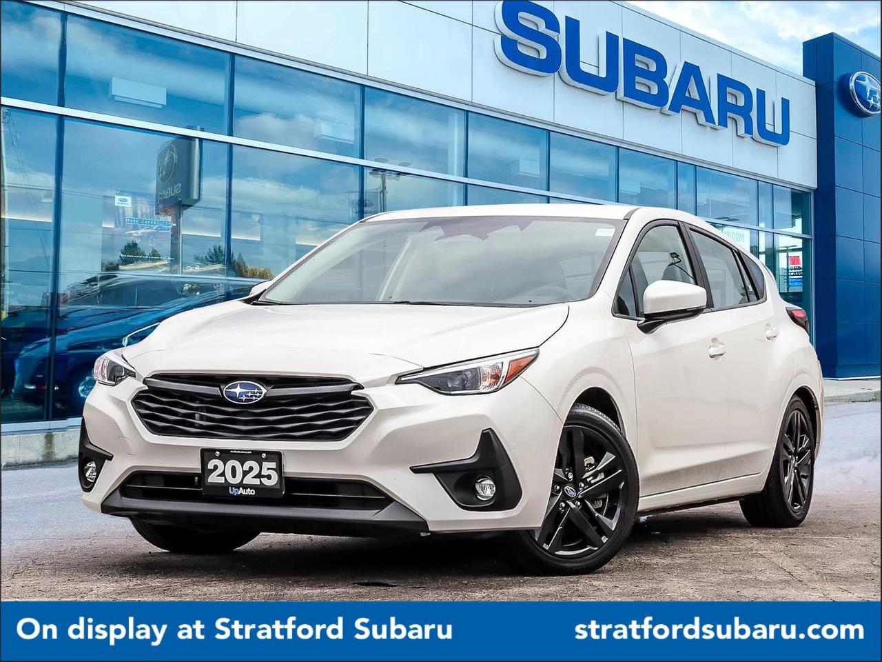 The 2025 Subaru Impreza Touring CVT is a refined compact hatchback with standard Symmetrical AWD, a smooth CVT, advanced safety tech, and a comfortable, upscale cabin built for all-weather confidence.<div><br></div><ul><li>Apple CarPlay/Android Auto smart device wireless mirroring</li><li>Lane Centring Assist hands-on cruise control</li><li>EyeSight Pre-Collision Braking forward collision mitigation</li><li>EyeSight Pre-Collision Braking pedestrian impact prevention</li><li>Rear mounted camera</li><li>EyeSight Lane Keep Assist</li><li>EyeSight Adaptive Cruise Control</li><li>EyeSight Pre-Collision Throttle Management predictive brake assist system</li><li>Cruise control with steering wheel mounted controls</li><li>STARLINK (subscription required) smart device engine start control</li><li>Heated steering wheel</li><li>Heated driver and front passenger seats</li><li>Primary monitor touchscreen</li></ul><div><br></div><div>At Stratford Subaru, our skilled sales team is enthusiastic about sharing their expertise with you. Were here to answer any questions you may have and make arrangements for a test drive that suits your schedule. Let us assist you in finding the perfect vehicle to match your needs and preferences.</div><div>&nbsp;</div><div>Dont hesitate to reach out to us via this listing or by phone. Were ready and willing to help make your car-buying experience enjoyable and hassle-free!</div><div>&nbsp;</div><div>This vehicle is currently showcased at our location in Stratford.&nbsp;</div><div>&nbsp;</div><div>Our operating hours are as follows: Monday to Friday: 9:00 am-6:00 pm, Saturday: 9:00 am-4:00 pm, Sunday: Closed.</div><div>&nbsp;</div><div>Were looking forward to serving you soon!</div><div>&nbsp;</div><div>Additional HST and licensing fees apply.</div><div>&nbsp;</div><div>Please contact us for further details.</div><div>UpAuto, born from a vision to redefine automotive retailing, signifies a departure from the conventional dealership archetype. Its a purpose-built enterprise meticulously crafted to drive growth and enhance performance across all its dealership entities, with a steadfast commitment to benefiting all involved parties.</div><div>The name UpAuto isnt just a title; its a philosophyan embodiment of the companys unwavering dedication to upward mobility in every operational facet within its dealership network. With an ethos rooted in maximizing performance and delivering unparalleled quality results, UpAuto inaugurates a new era in automotive retail, where innovation and excellence seamlessly merge to shape the future of the industry.</div><div><br></div>