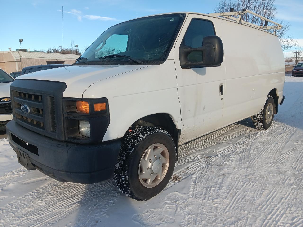 Used 2012 Ford Econoline E150 Cargo with roof rack and compressor for sale in Edmonton, AB