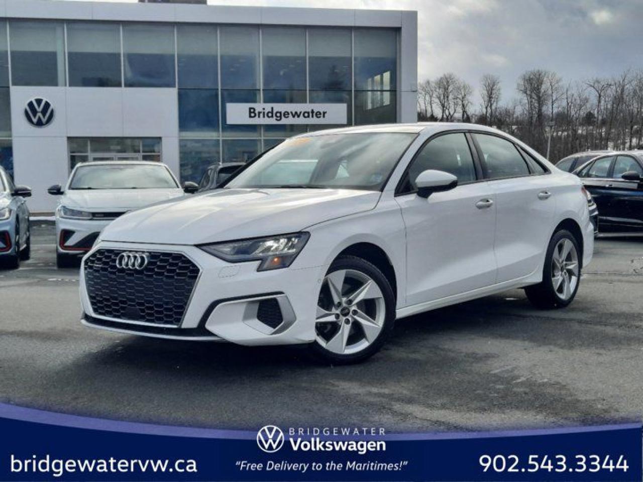 New Price! White 2023 Audi A3 40 Komfort quattro | Apple CarPlay | Sirus XM | Android Auto quattro 7-Speed Automatic S tronic 2.0L 4-Cylinder TFSI Bridgewater Volkswagen, Located in Bridgewater Nova Scotia.quattro, Black/Rock Gray Stitching Leather, 4-Wheel Disc Brakes, 6 Speakers, ABS brakes, Air Conditioning, Alloy wheels, AM/FM radio: SiriusXM, Automatic temperature control, Brake assist, Bumpers: body-colour, Delay-off headlights, Driver door bin, Driver vanity mirror, Dual front impact airbags, Dual front side impact airbags, Electronic Stability Control, Emergency communication system: Audi connect Security and Assistance, Exterior Parking Camera Rear, Four wheel independent suspension, Front anti-roll bar, Front Bucket Seats, Front dual zone A/C, Front reading lights, Fully automatic headlights, Garage door transmitter: HomeLink, Heated door mirrors, Heated Front Seats, Heated front seats, Illuminated entry, Knee airbag, Leather Seating Surfaces, Leather steering wheel, Low tire pressure warning, Occupant sensing airbag, Outside temperature display, Overhead airbag, Overhead console, Panic alarm, Passenger door bin, Passenger vanity mirror, Power door mirrors, Power driver seat, Power moonroof, Power steering, Power windows, Radio data system, Radio: Audi Sound System w/SiriusXM Satellite, Rain sensing wipers, Rear anti-roll bar, Rear fog lights, Rear reading lights, Rear side impact airbag, Rear window defroster, Remote keyless entry, Security system, Speed control, Speed-sensing steering, Speed-Sensitive Wipers, Split folding rear seat, Steering wheel mounted audio controls, Tachometer, Telescoping steering wheel, Tilt steering wheel, Traction control, Trip computer, Turn signal indicator mirrors, Variably intermittent wipers, Wheels: 8J x 17 5-Arm Design.Certification Program Details: 150 Points Inspection Fresh Oil Change Free Carfax Full Detail 2 years MVI Full Tank of Gas The 150+ point inspection includes: Engine Instrumentation Interior components Pre-test drive inspections The test drive Service bay inspection Appearance Final inspection