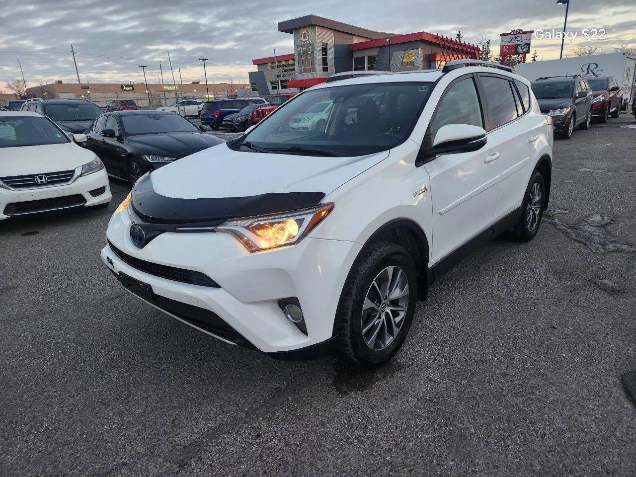 Used 2018 Toyota RAV4 AWD Hybrid LE for sale in Calgary, AB