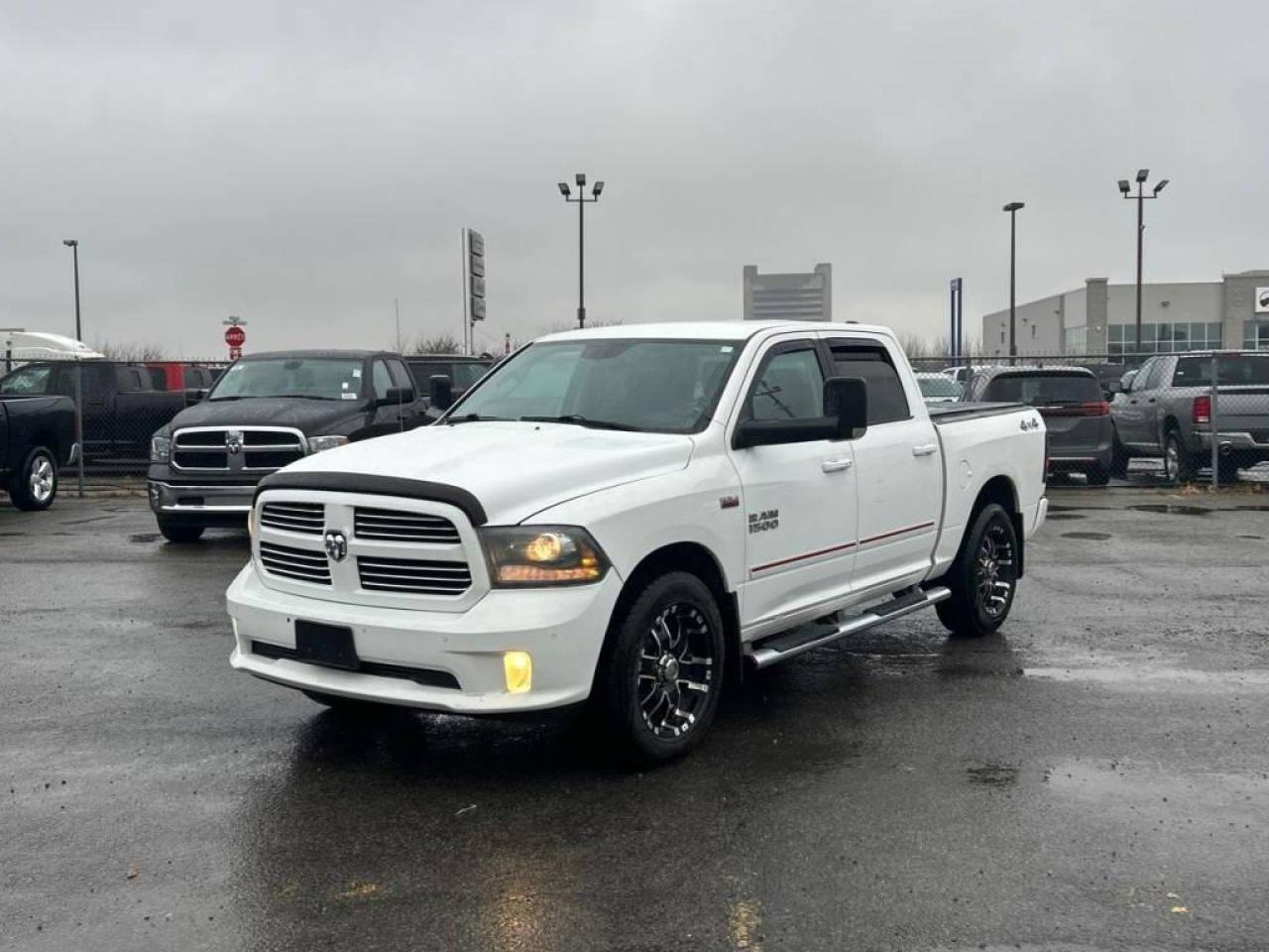 Used 2014 RAM 1500 4WD Crew Cab 140.5