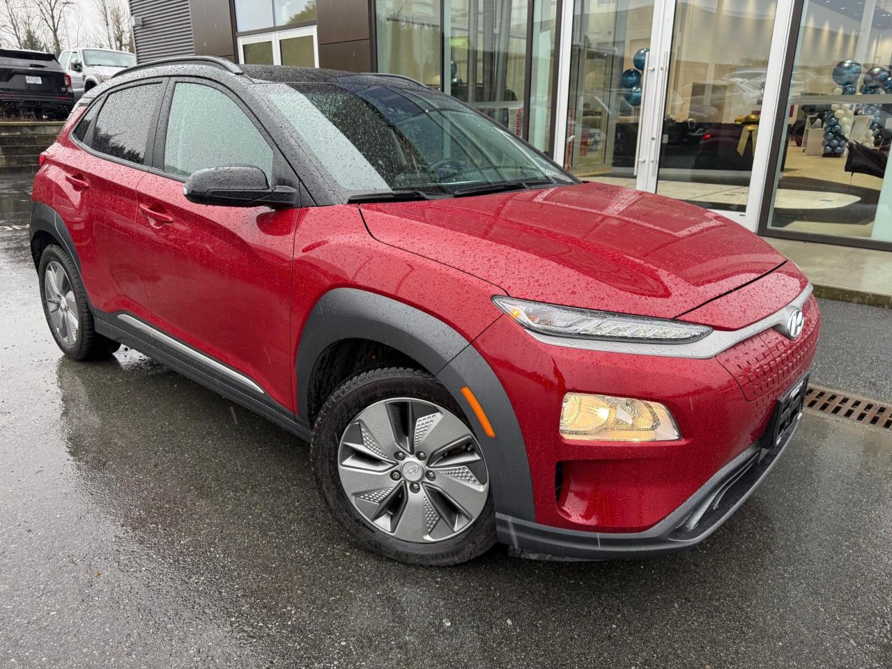 <p> PST EXEMPT | CERTIFIED ACCIDENT FREE |  TWO TONE PKG | INFINITY PREMIUM AUDIO SOUND SYSTEM <p>

<p>

The 2021 Hyundai Kona EV Preferred 2-Tone is a stylish and eco-friendly compact crossover that combines cutting-edge electric performance with a bold, modern design. Featuring a distinctive two-tone color scheme, it pairs a contrasting roof color with the body, enhancing its dynamic appearance and giving it a more youthful and energetic feel. The exterior showcases sleek lines, a wide grille, and LED lighting elements that create a futuristic vibe, while alloy wheels add to its athletic stance. This model also includes advanced safety features such as forward collision avoidance assist, lane-keeping assist, and blind-spot monitoring, ensuring peace of mind while driving. </p>

<p>

Inside, the 2021 Kona EV Preferred 2-Tone delivers a comfortable and tech-savvy cabin with a premium feel. The interior combines practical functionality with modern amenities, offering a digital display, a touchscreen infotainment system with Apple CarPlay and Android Auto integration, and a wireless charging pad. The spacious cabin accommodates both driver and passengers with ample headroom and legroom, while the high-quality materials enhance the overall comfort. Powered by an electric motor, the Kona EV Preferred 2-Tone provides an impressive range, making it a versatile and efficient choice for daily commutes and road trips alike.</p>

<P> 

All Abbotsford Hyundai pre-owned vehicles come complete with the remaining Manufacturers Warranty plus a vehicle safety report and a CarFax history report. Abbotsford Hyundai is a BBB accredited pre-owned car dealership, serving the Fraser Valley and our friends in Surrey, Langley and surrounding Lower Mainland areas. We are your Friendly Fraser Valley car dealer. We are located at 30250 Automall Drive in Abbotsford. Call or email us to schedule a test drive. </p>

<p>

*All Sales are subject to Taxes, $699 Doc fee and $87 Fuel Surcharge. </p>