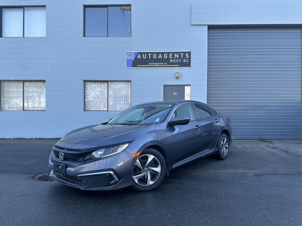 <div>Introducing the 2020 Honda Civic LX in stylish Modern Steel Metallica reliable and efficient compact sedan designed to meet your everyday needs with style and practicality. With 99,201 km, this Civic offers excellent performance and dependability for years to come.</div><br /><div>Powered by a fuel-efficient 2.0L 4-cylinder engine paired with a smooth CVT transmission, the Civic LX delivers a responsive and economical driving experience. Its well-tuned suspension and precise handling make it a pleasure to drive, whether in the city or on the highway.</div><br /><div>Inside, the Civic LX features a spacious and comfortable cabin with premium cloth seating and a driver-focused design. Stay connected with the 7-inch touchscreen infotainment system, which includes Apple CarPlay, Android Auto, Bluetooth, and USB connectivity for seamless integration of your devices.</div><br /><div>Honda places a strong emphasis on safety, equipping the Civic LX with the Honda Sensing suite, including adaptive cruise control, lane-keeping assist, collision mitigation braking, and road departure mitigation. A multi-angle rearview camera and stability control add to the peace of mind on every trip.</div><br /><div>With its sleek design, advanced features, and legendary reliability, the 2020 Honda Civic LX in Modern Steel Metallic is an excellent choice for anyone seeking a dependable and stylish sedan.</div><br /><div>Home delivery/Canada-wide shipping available. 3rd party inspections are always welcome. Financing available OAC, all credit types approved. Trades are welcome. Dealer #D50184.</div>